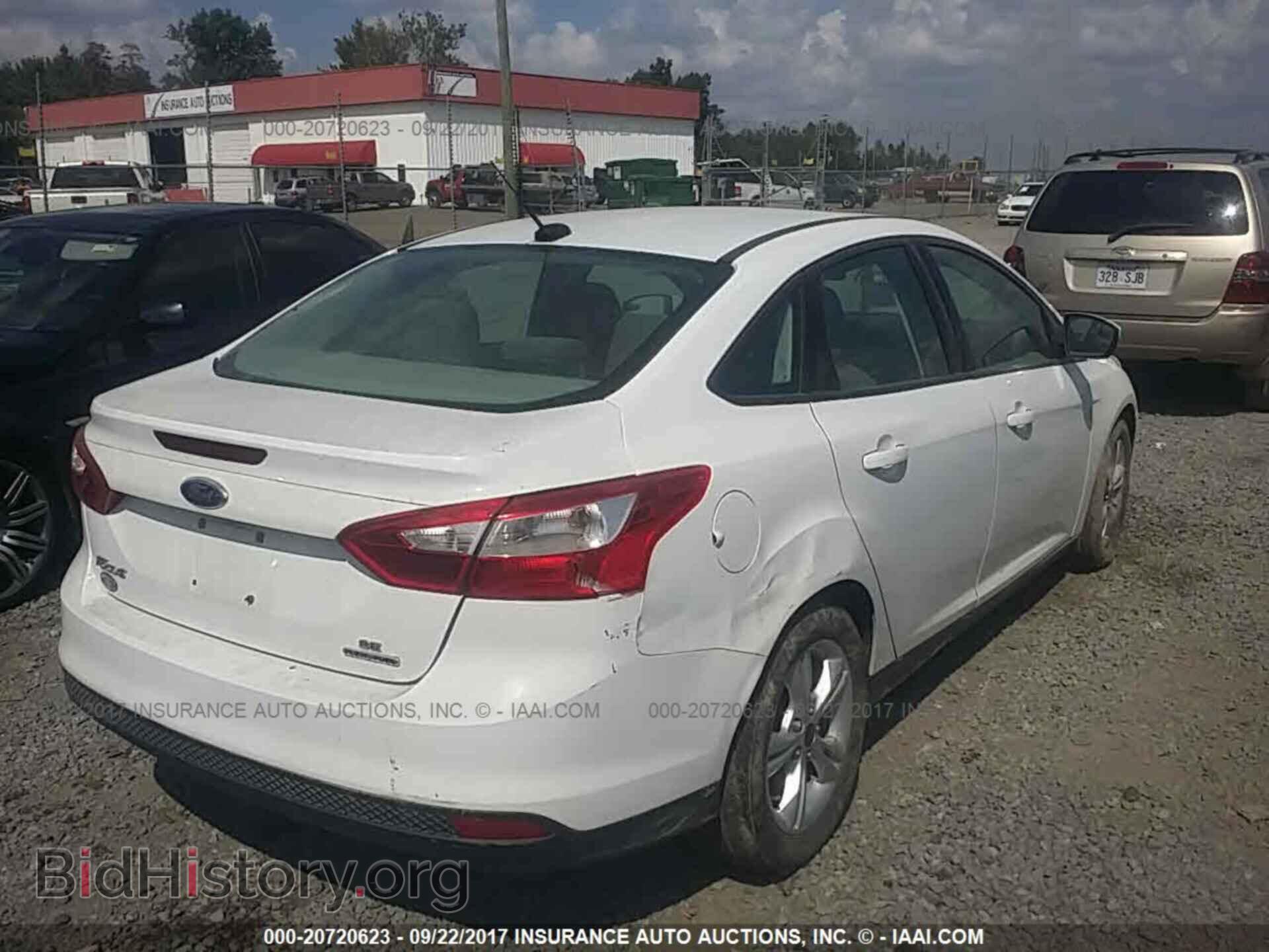 2014 Ford Focus - VIN: 1FADP3F28EL367991 - Photo 4