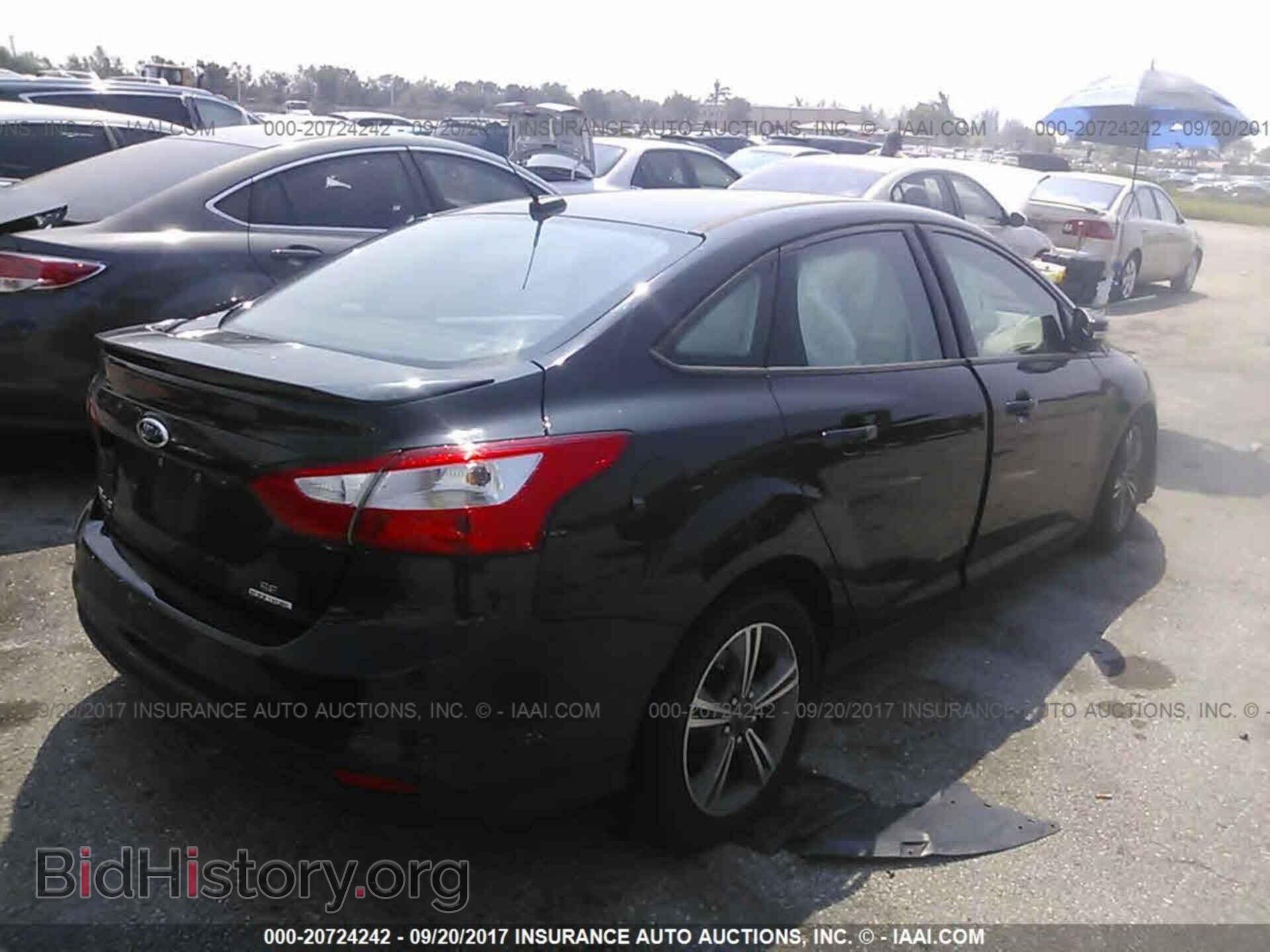 2014 Ford Focus - VIN: 1FADP3F29EL216237 - Фото 4