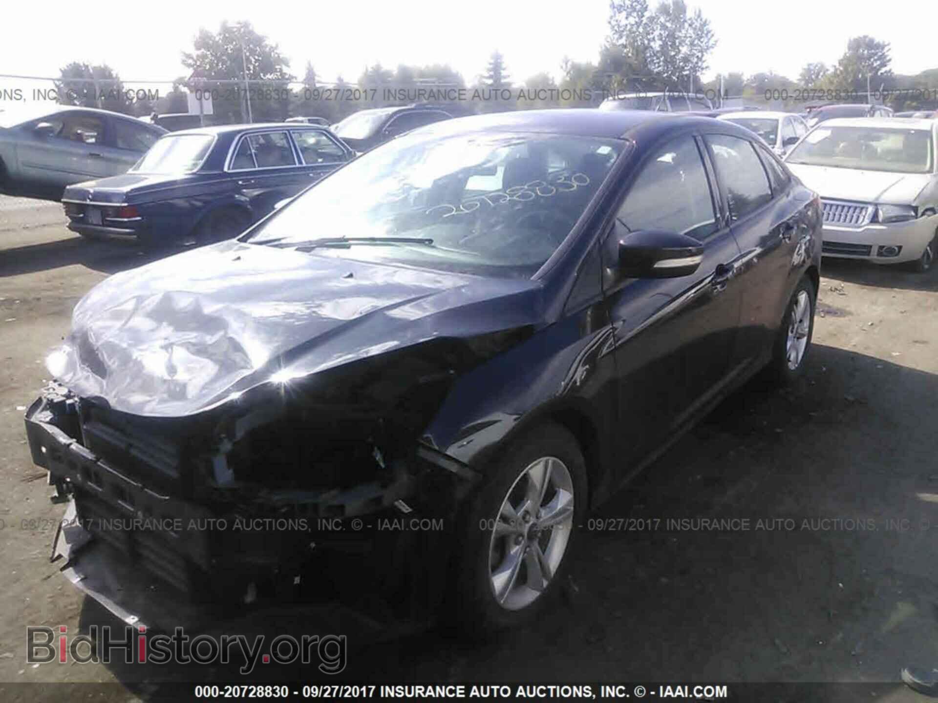 2014 Ford Focus - VIN: 1FADP3F23EL305222 - Фото 2