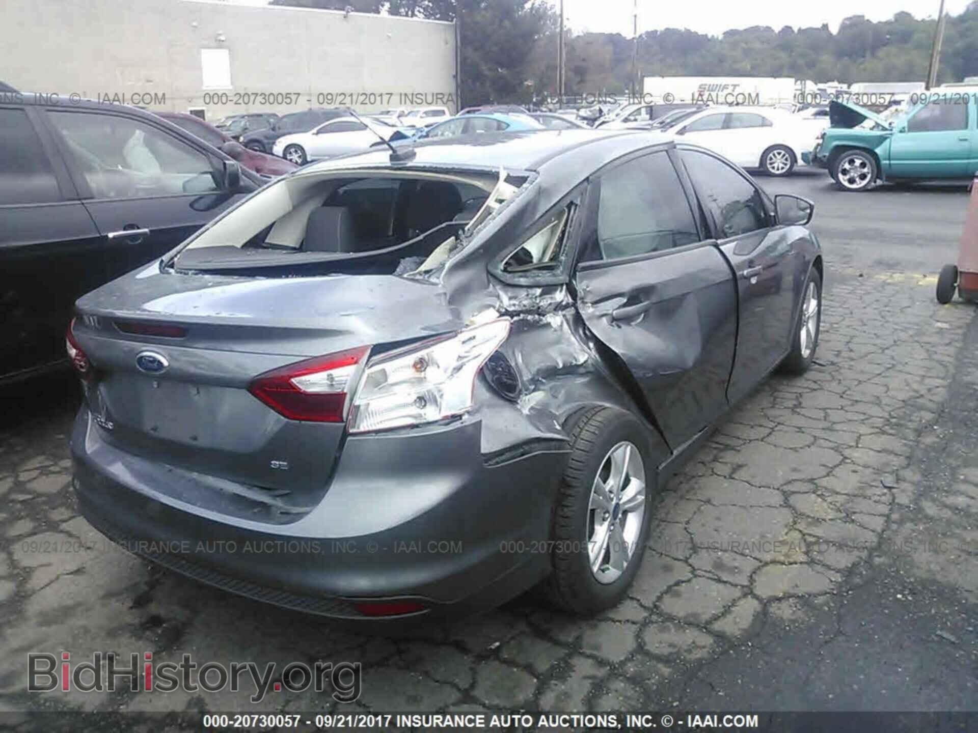 2014 Ford Focus - VIN: 1FADP3F29EL300624 - Фото 4