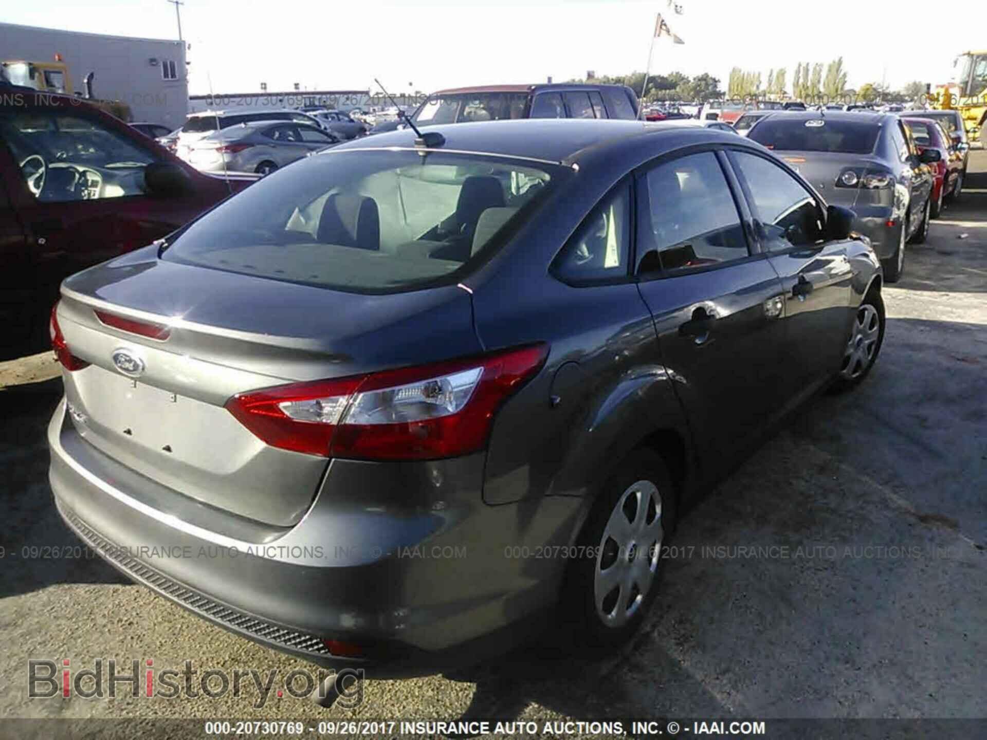 2012 Ford Focus - VIN: 1FAHP3E29CL215704 - Photo 4