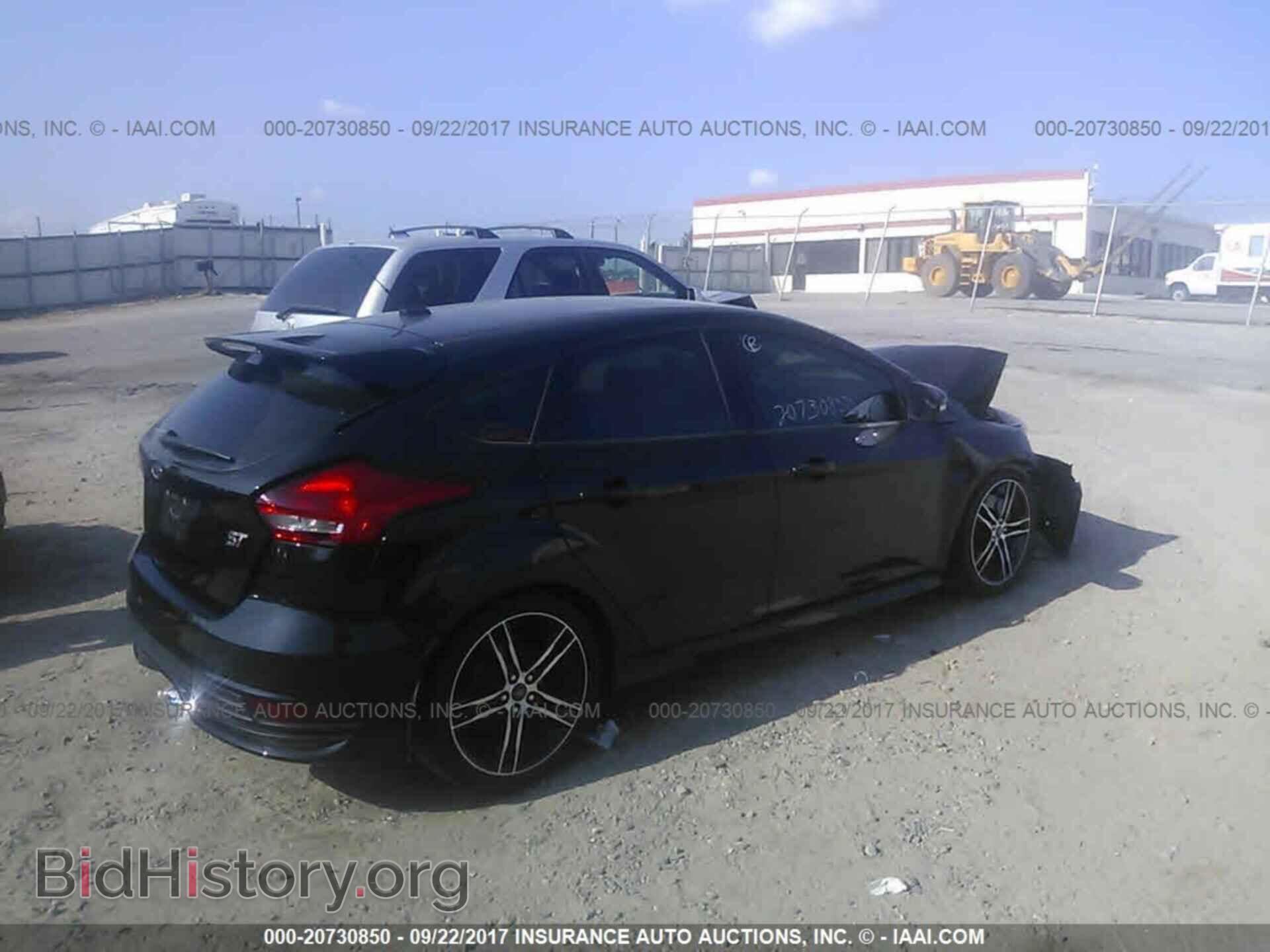 2015 Ford Focus - VIN: 1FADP3L97FL259087 - Photo 4