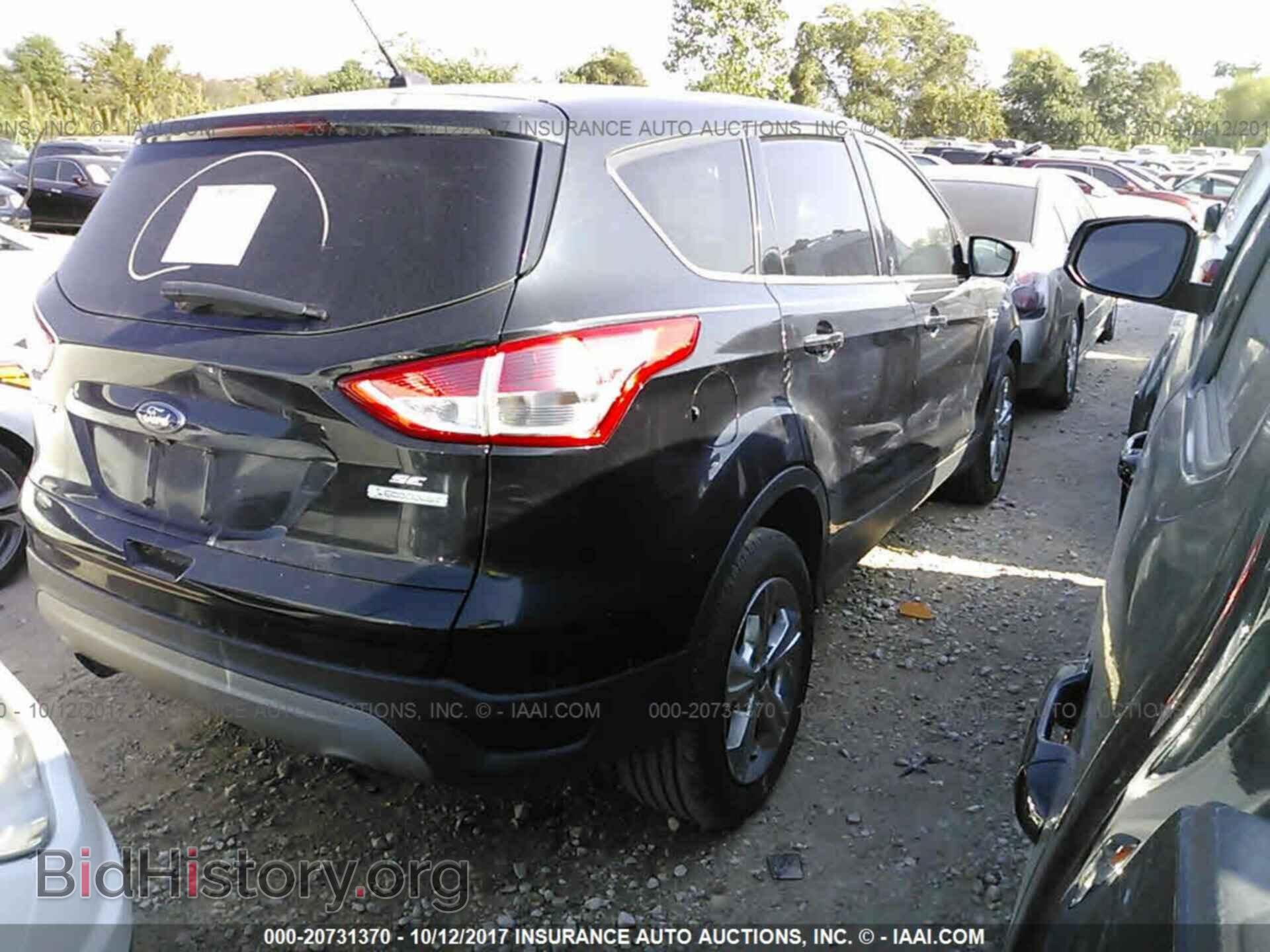 2014 Ford Escape - VIN: 1FMCU0GX0EUB66244 - Photo 4