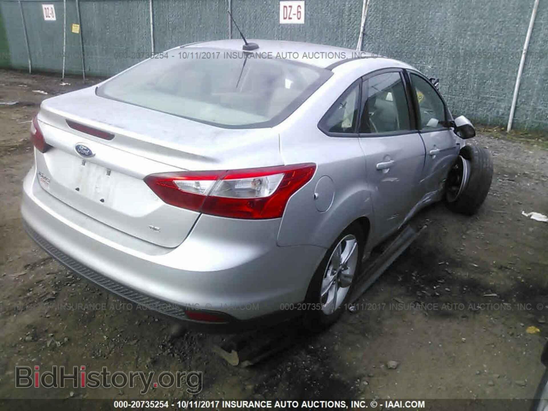 2014 Ford Focus - VIN: 1FADP3F22EL434889 - Фото 4