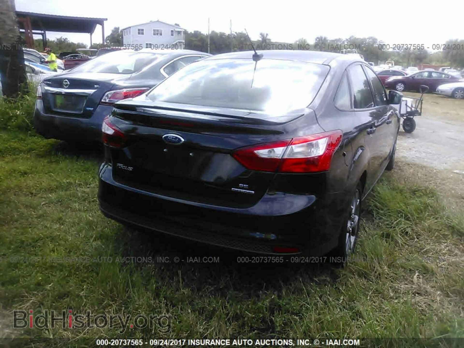 2013 Ford Focus - VIN: 1FADP3F22DL273149 - Photo 4