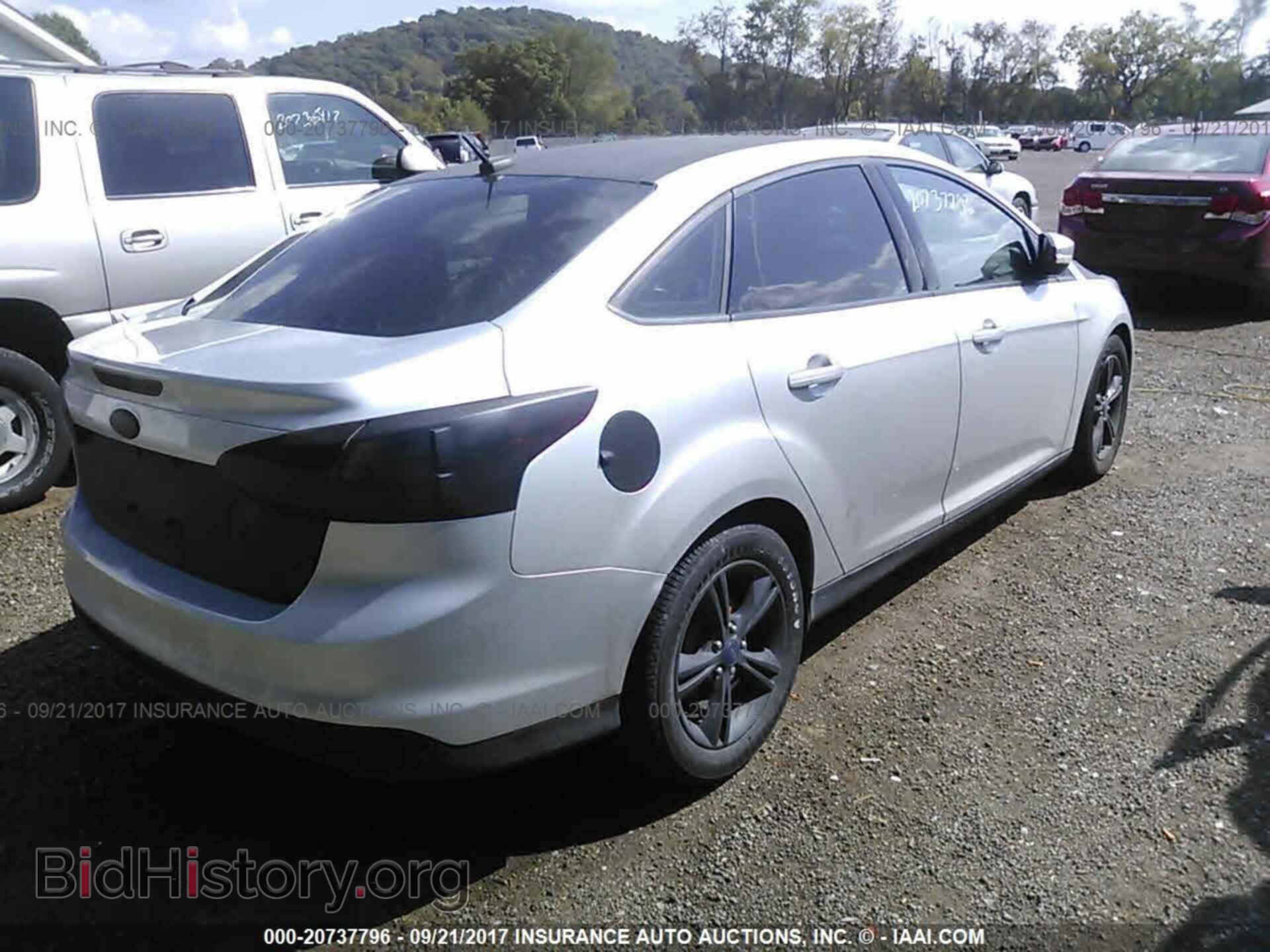 2014 Ford Focus - VIN: 1FADP3F26EL260423 - Фото 4