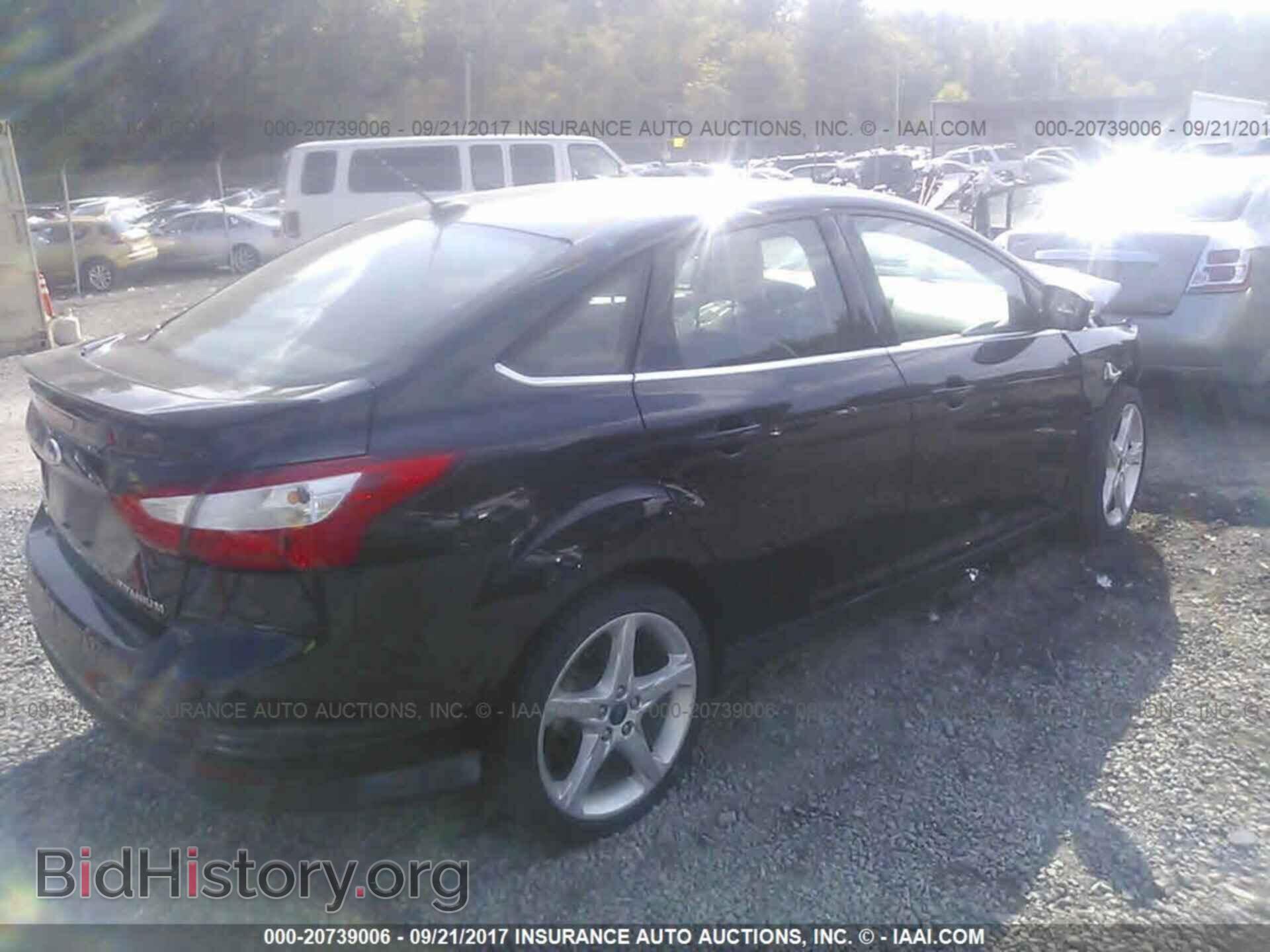 2012 Ford Focus - VIN: 1FAHP3J28CL335869 - Photo 4