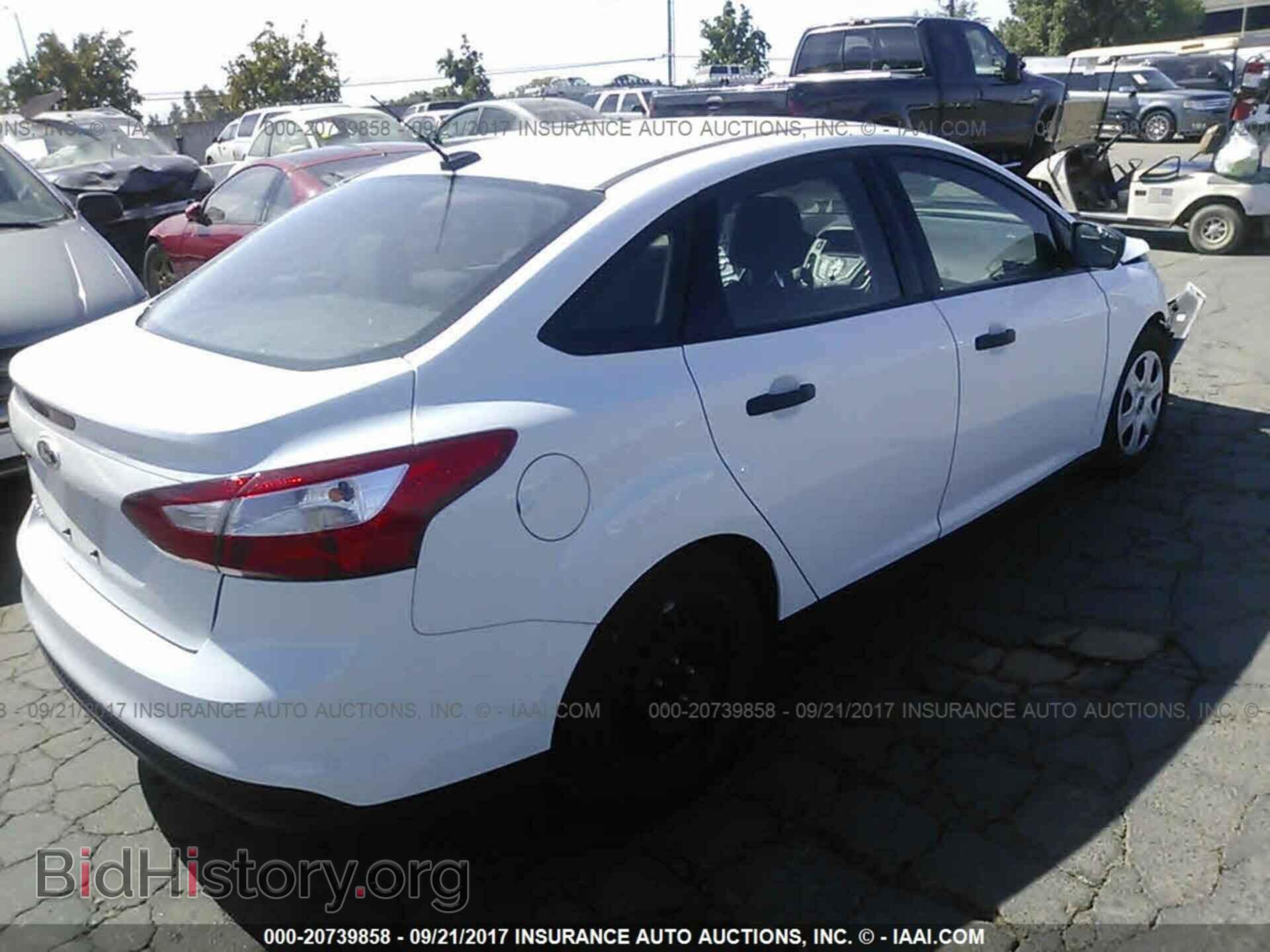 2014 Ford Focus - VIN: 1FADP3E24EL330552 - Фото 4