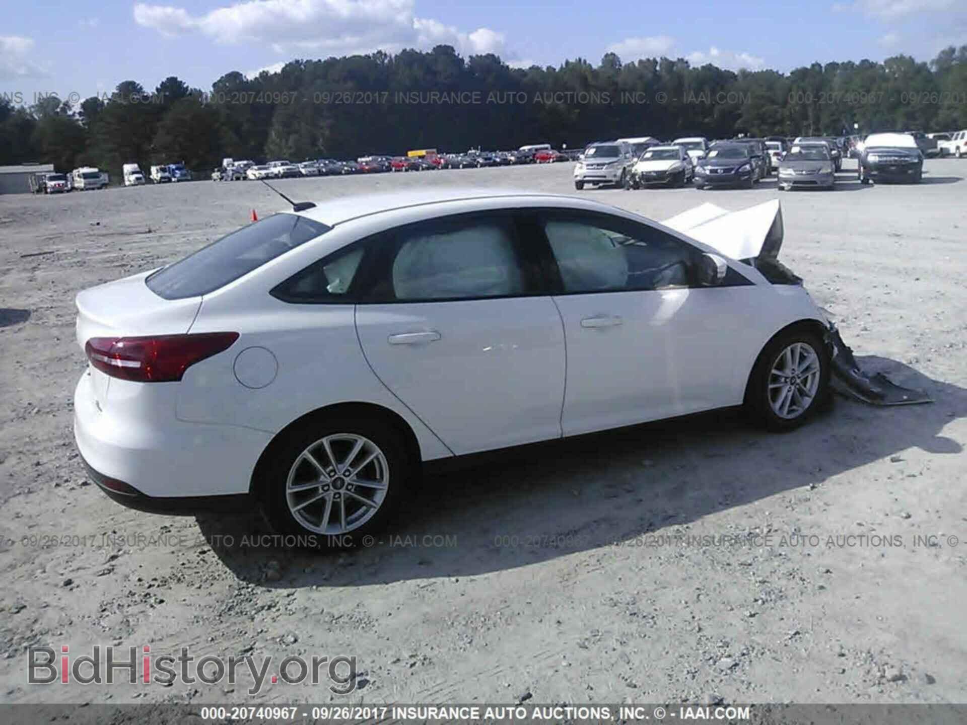 2015 Ford Focus - VIN: 1FADP3F29FL242533 - Photo 4