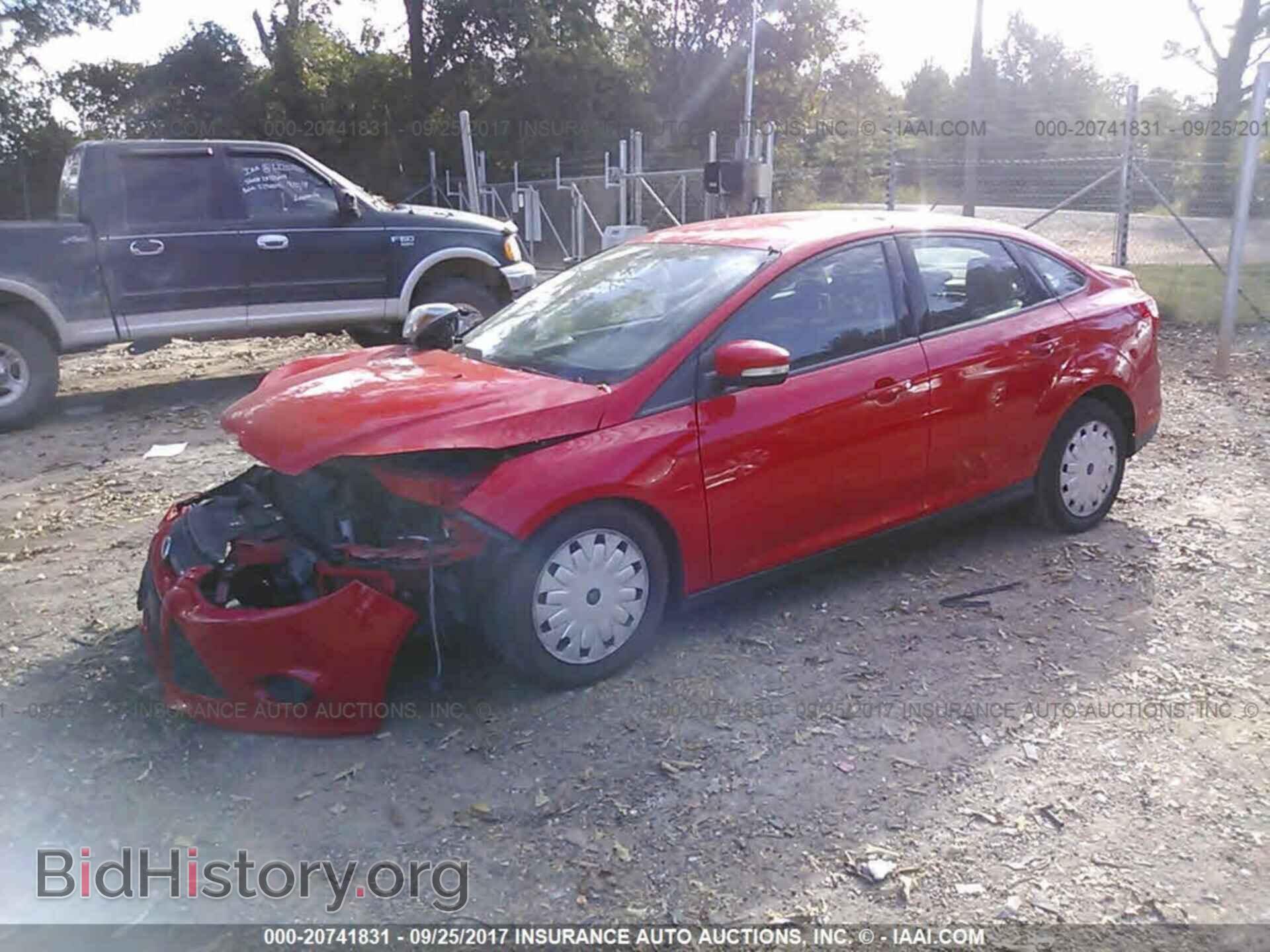 2014 Ford Focus - VIN: 1FADP3F2XEL104868 - Photo 2
