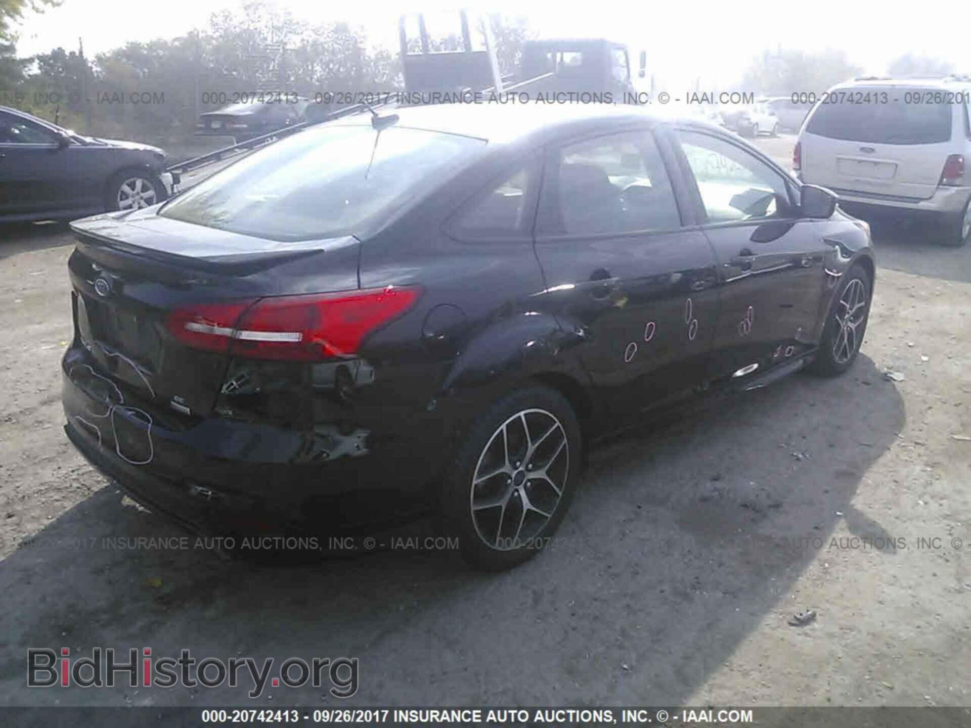 2015 Ford Focus - VIN: 1FADP3FE1FL216356 - Photo 4