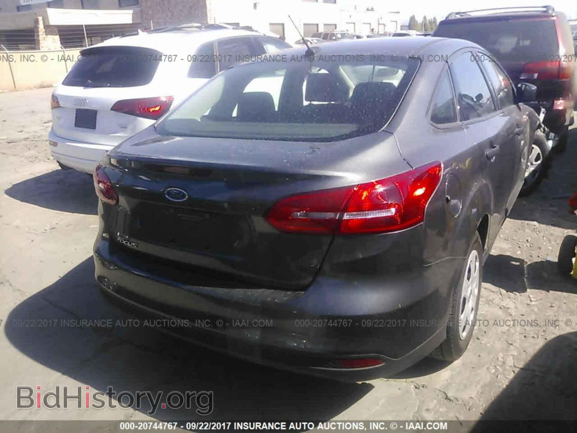 2015 Ford Focus - VIN: 1FADP3E21FL249039 - Фото 4