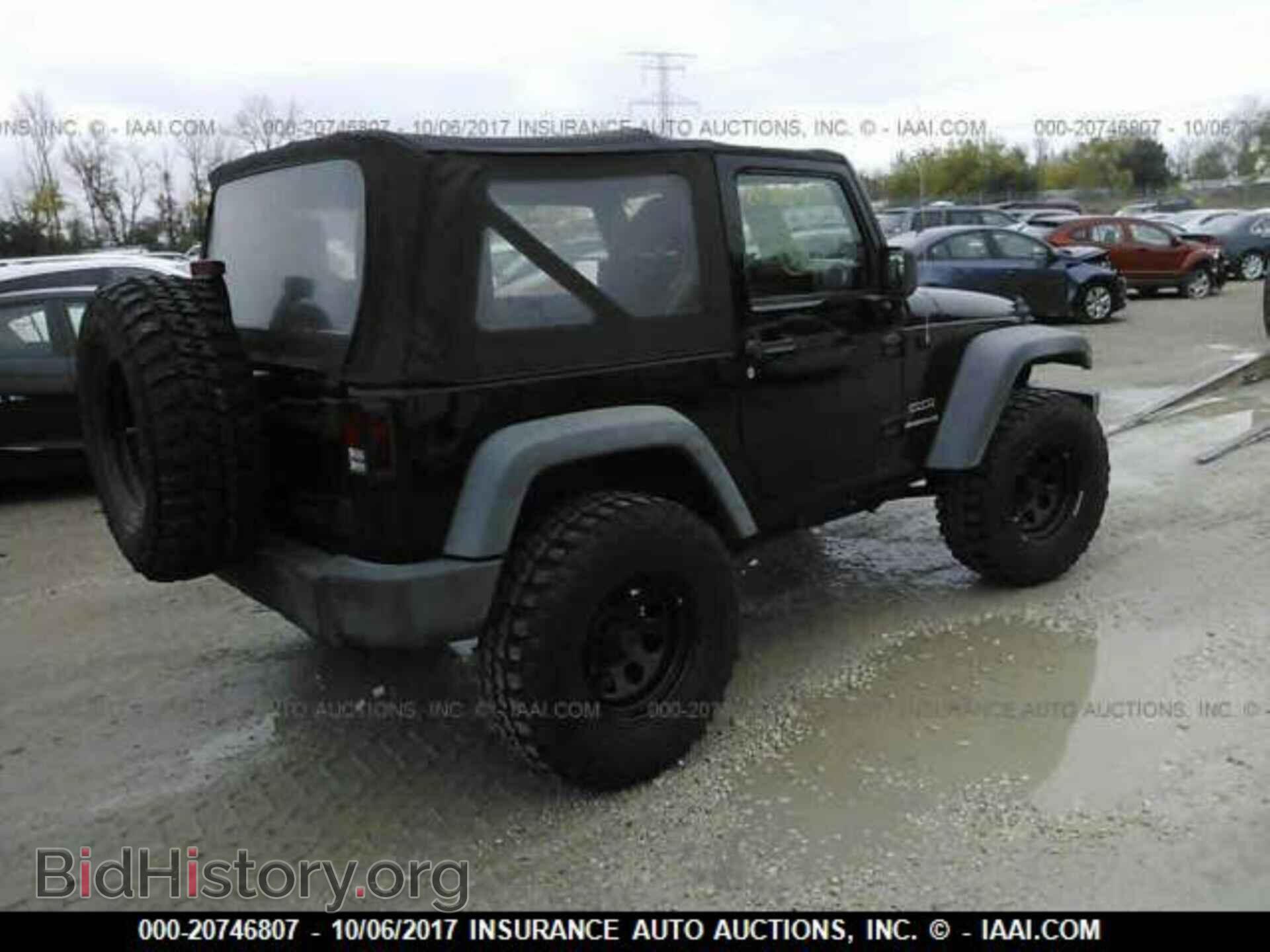2011 Jeep Wrangler - VIN: 1J4AA2D15BL510520 - Фото 4
