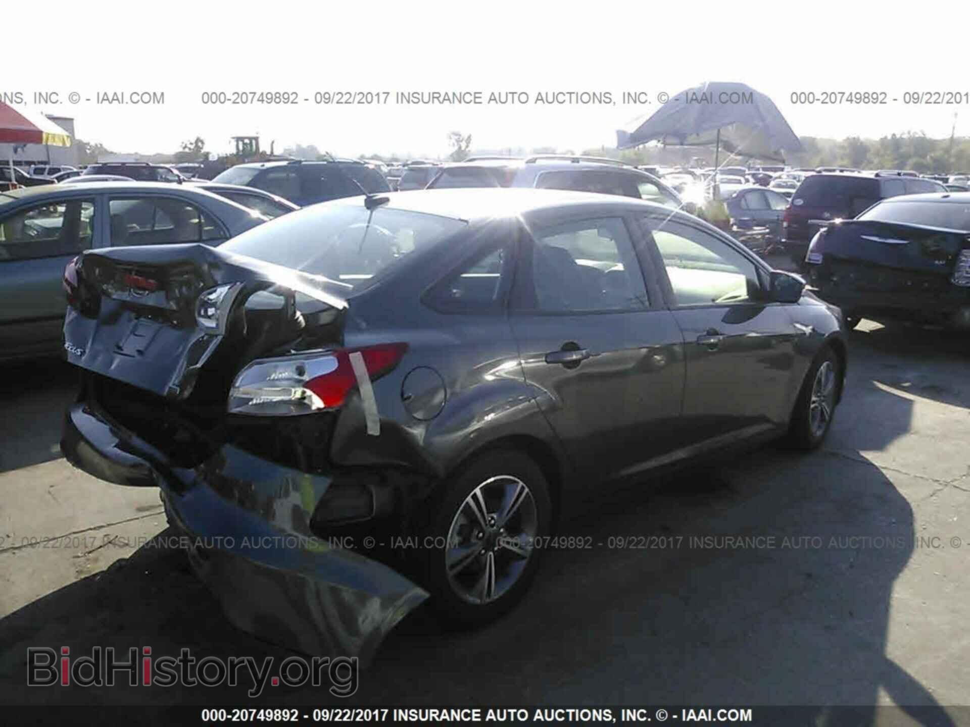 2017 Ford Focus - VIN: 1FADP3FE0HL309940 - Photo 4
