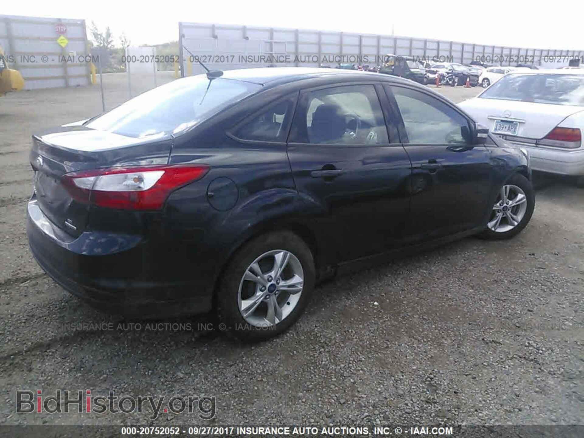 2014 Ford Focus - VIN: 1FADP3F2XEL228185 - Photo 4