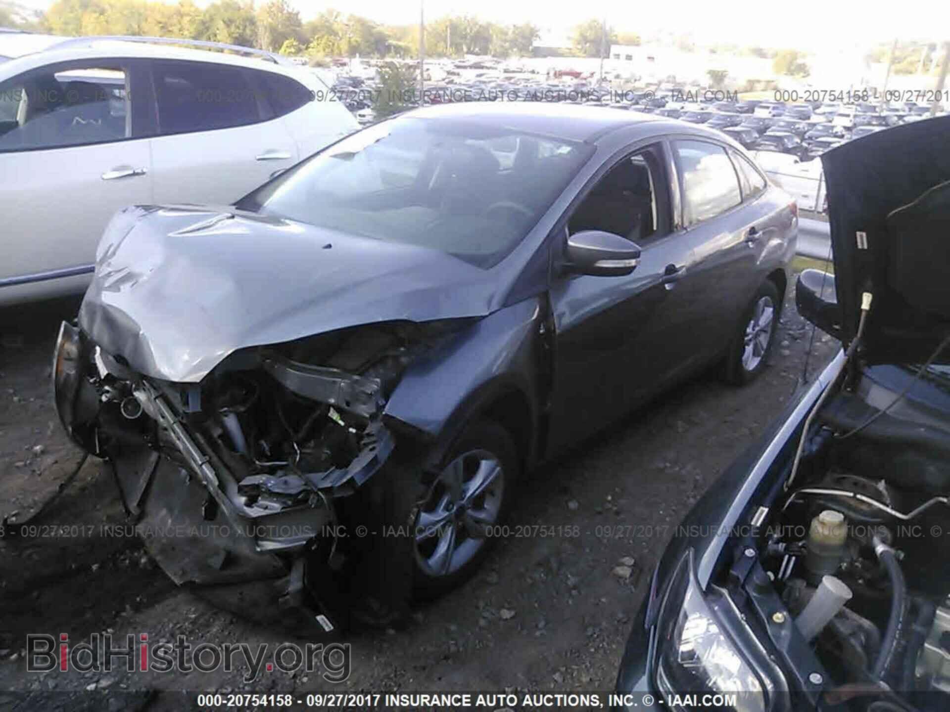 2014 Ford Focus - VIN: 1FADP3F25EL424907 - Photo 2