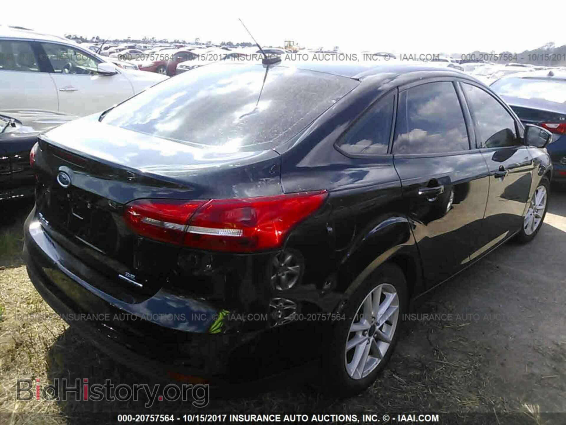 2015 Ford Focus - VIN: 1FADP3F20FL347901 - Photo 4