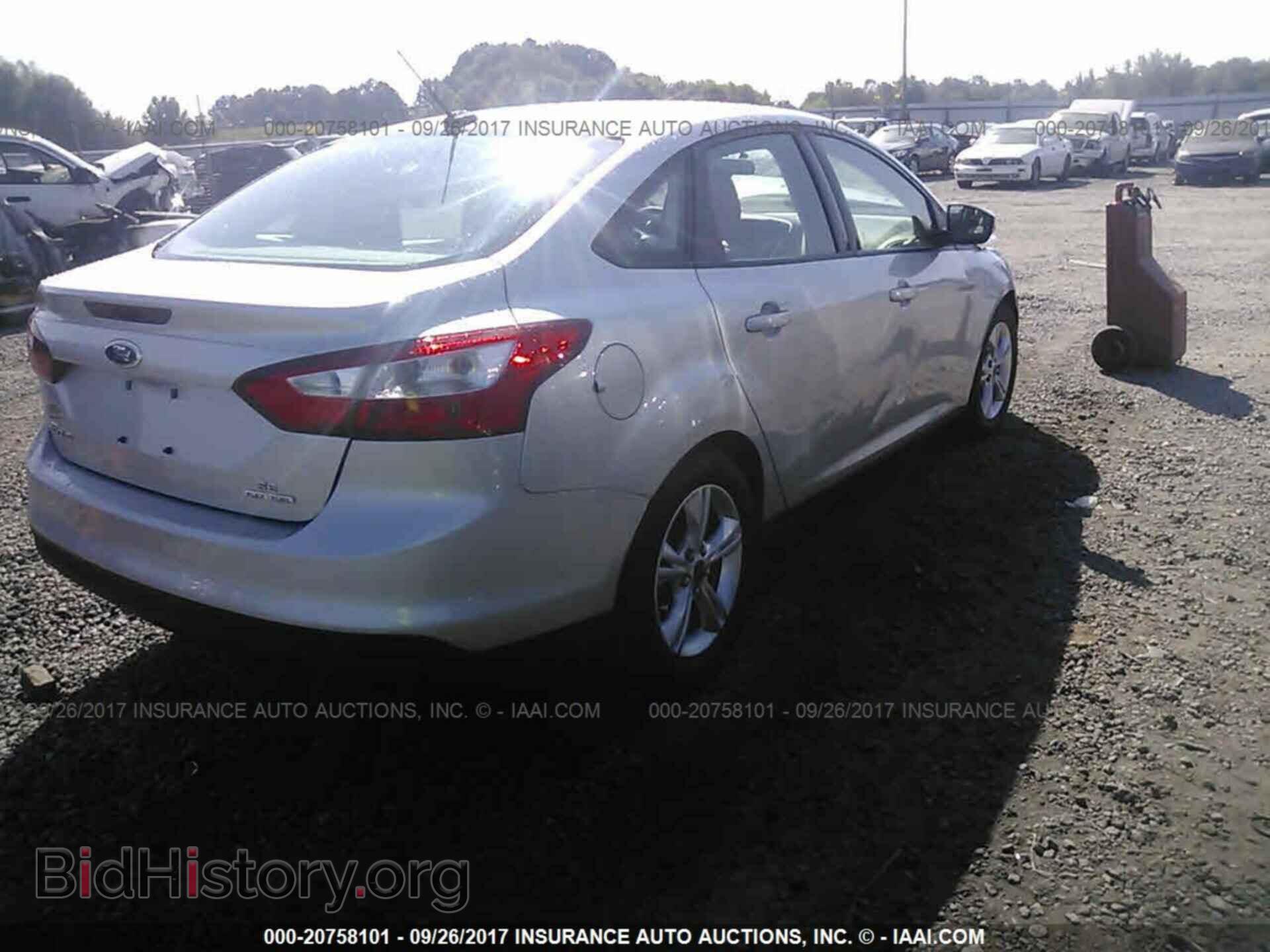 2014 Ford Focus - VIN: 1FADP3F29EL378613 - Photo 4