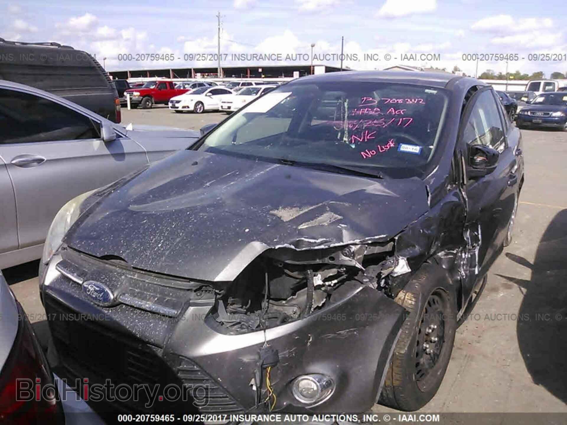 2012 Ford Focus - VIN: 1FAHP3F29CL201414 - Фото 2