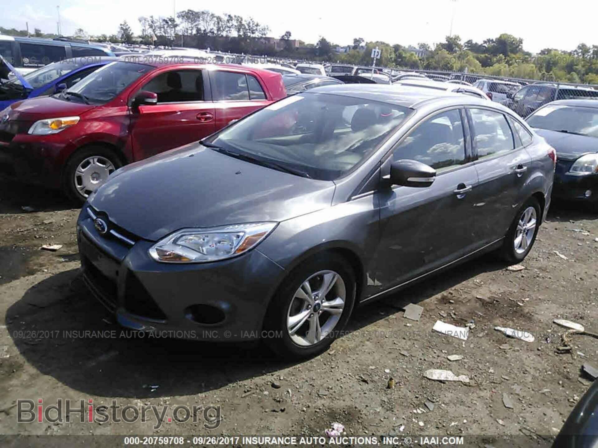 2013 Ford Focus - VIN: 1FADP3F20DL112184 - Фото 2