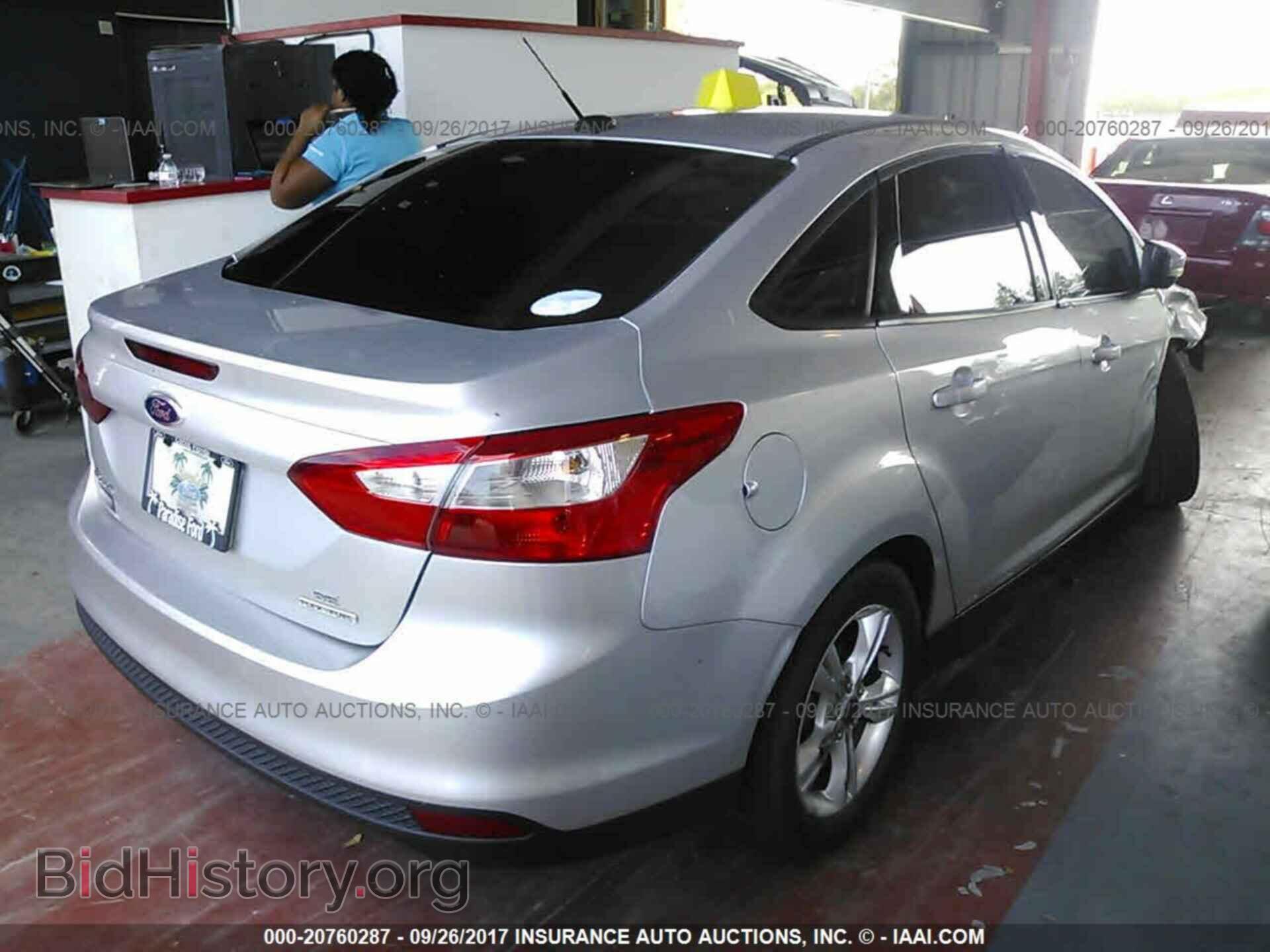 2014 Ford Focus - VIN: 1FADP3F2XEL396621 - Photo 4