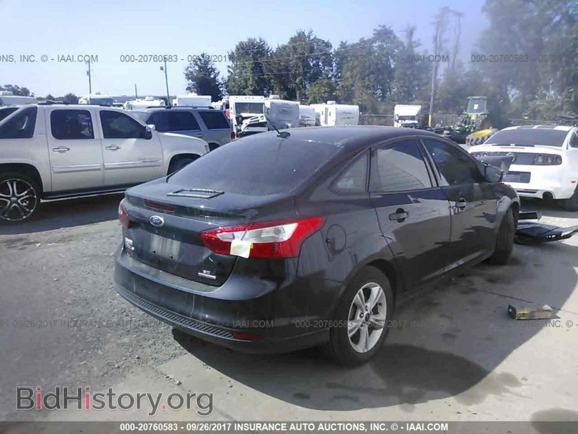 2014 Ford Focus - VIN: 1FADP3F27EL426173 - Фото 4
