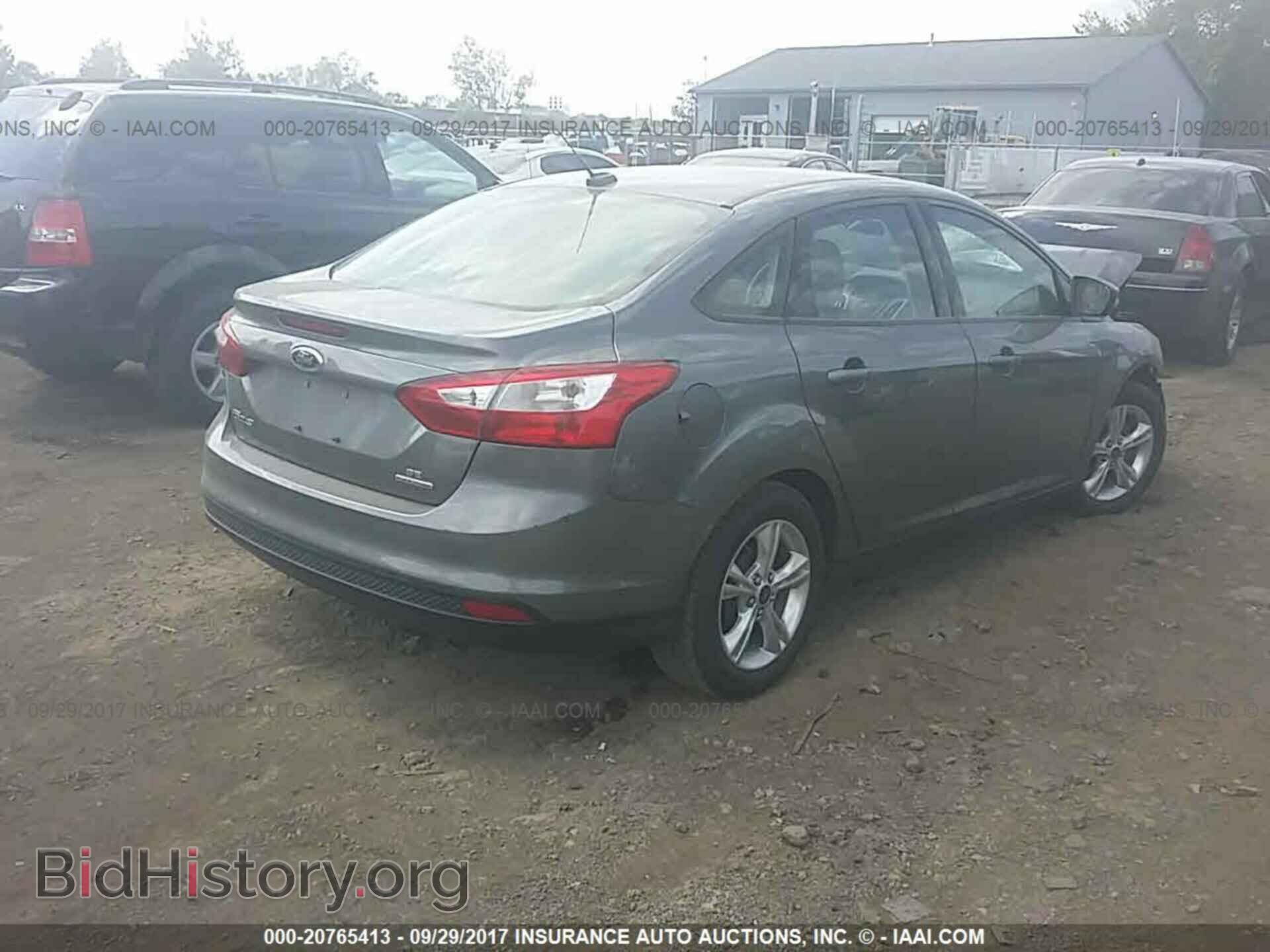 2014 Ford Focus - VIN: 1FADP3F28EL269611 - Photo 4