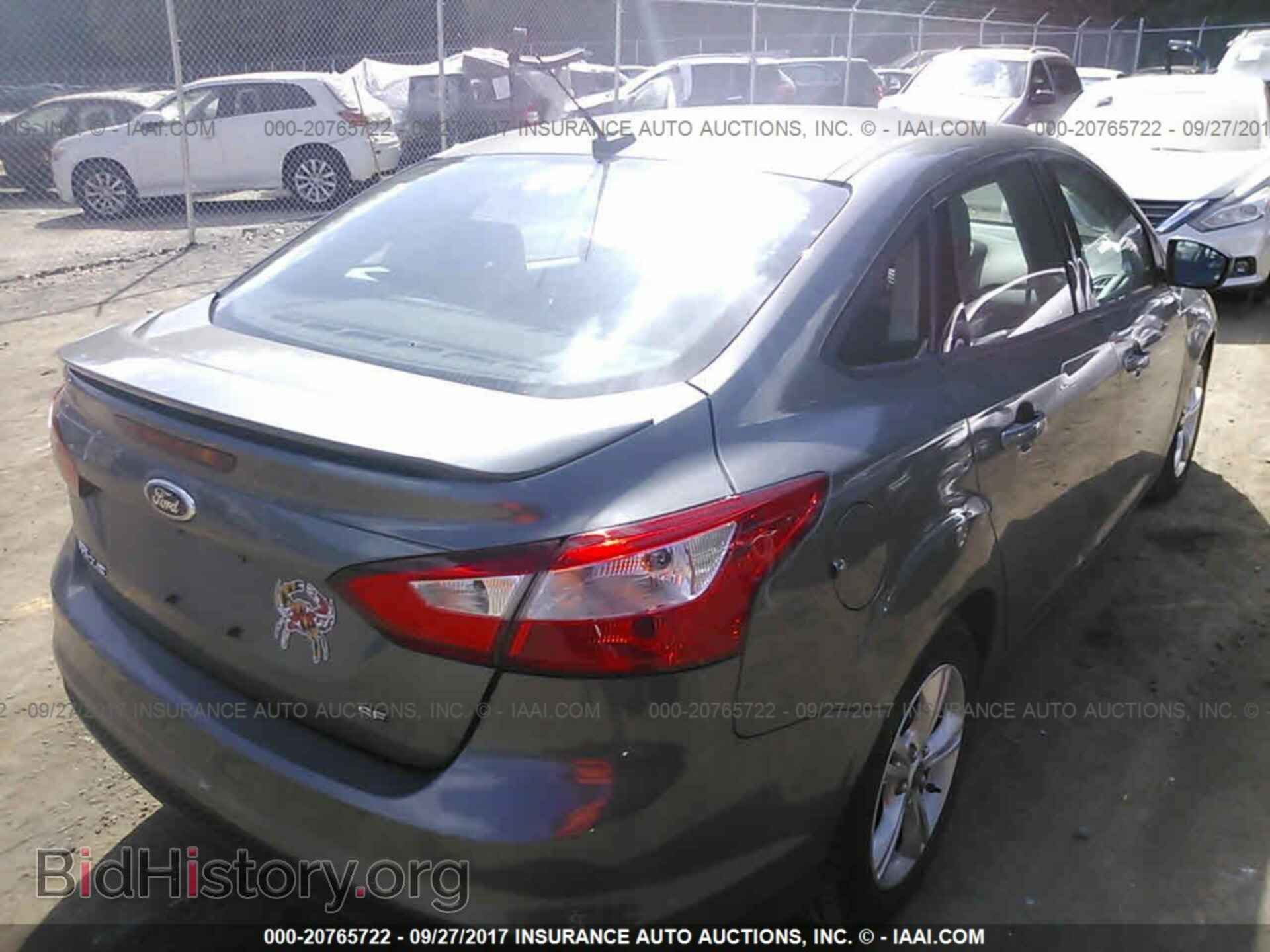 2012 Ford Focus - VIN: 1FAHP3F21CL390589 - Photo 4