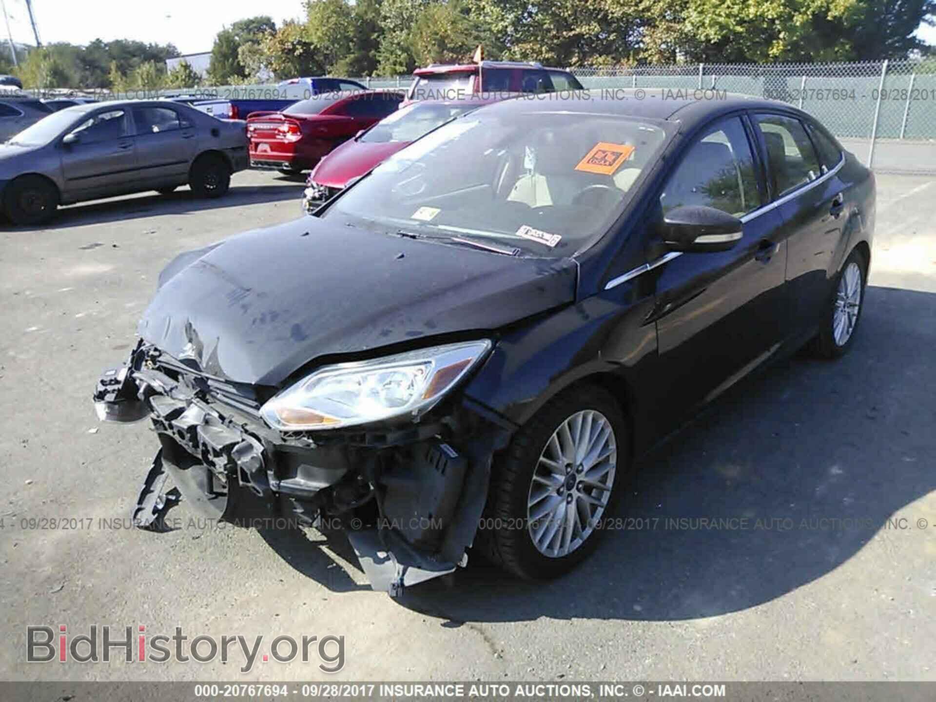 2012 Ford Focus - VIN: 1FAHP3H28CL390666 - Photo 2