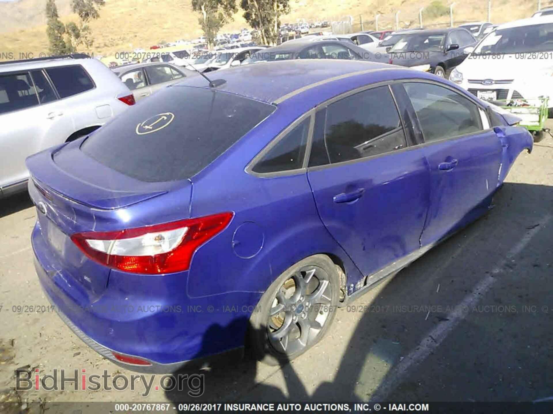 2013 Ford Focus - VIN: 1FADP3F2XDL210932 - Photo 4
