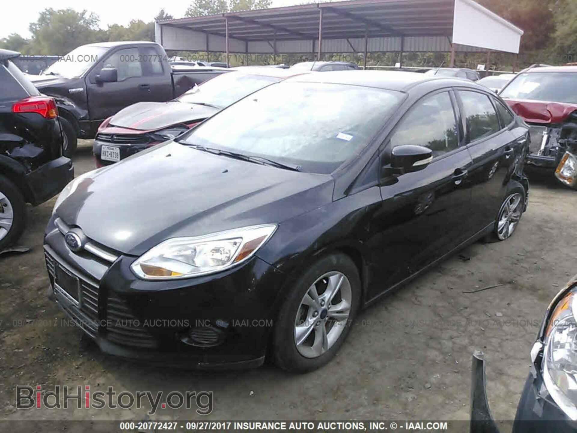 2014 Ford Focus - VIN: 1FADP3F24EL324328 - Photo 2