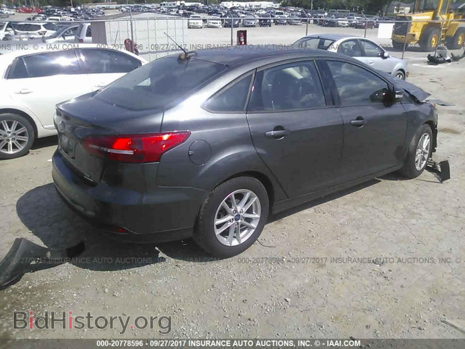 2016 Ford Focus - VIN: 1FADP3F2XGL337524 - Photo 4