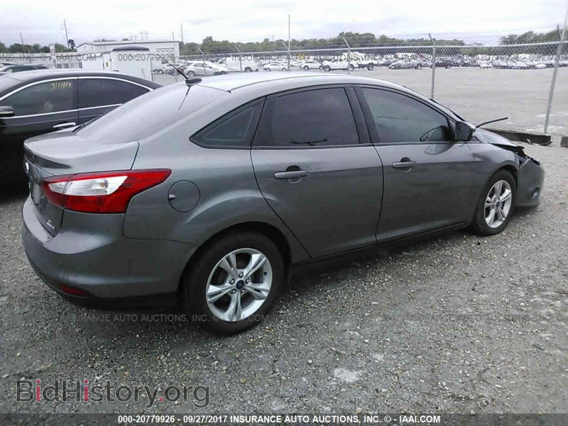 2014 Ford Focus - VIN: 1FADP3F28EL349412 - Фото 4