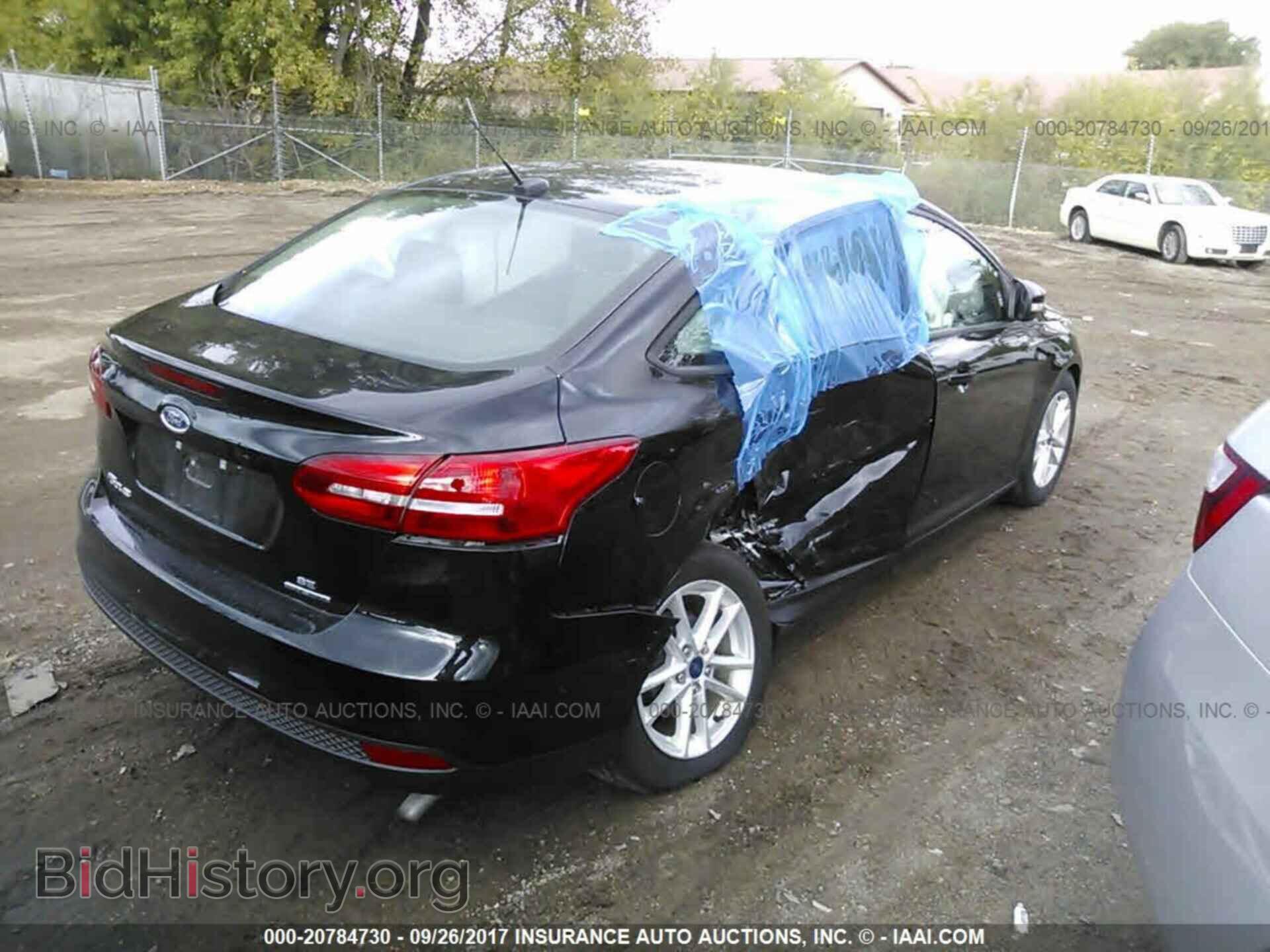 2016 Ford Focus - VIN: 1FADP3F20GL282128 - Photo 4