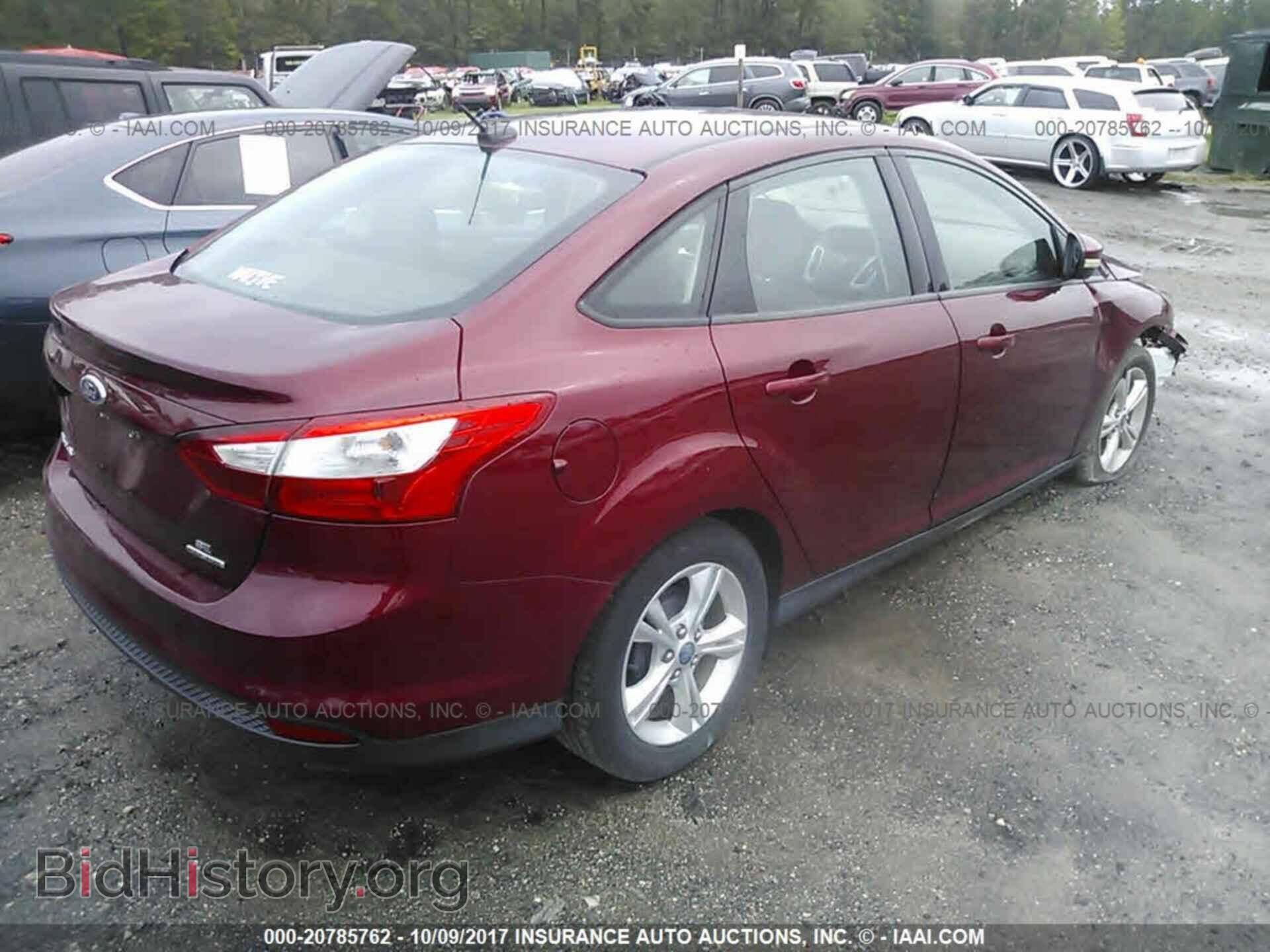 2013 Ford Focus - VIN: 1FADP3F2XDL266594 - Фото 4