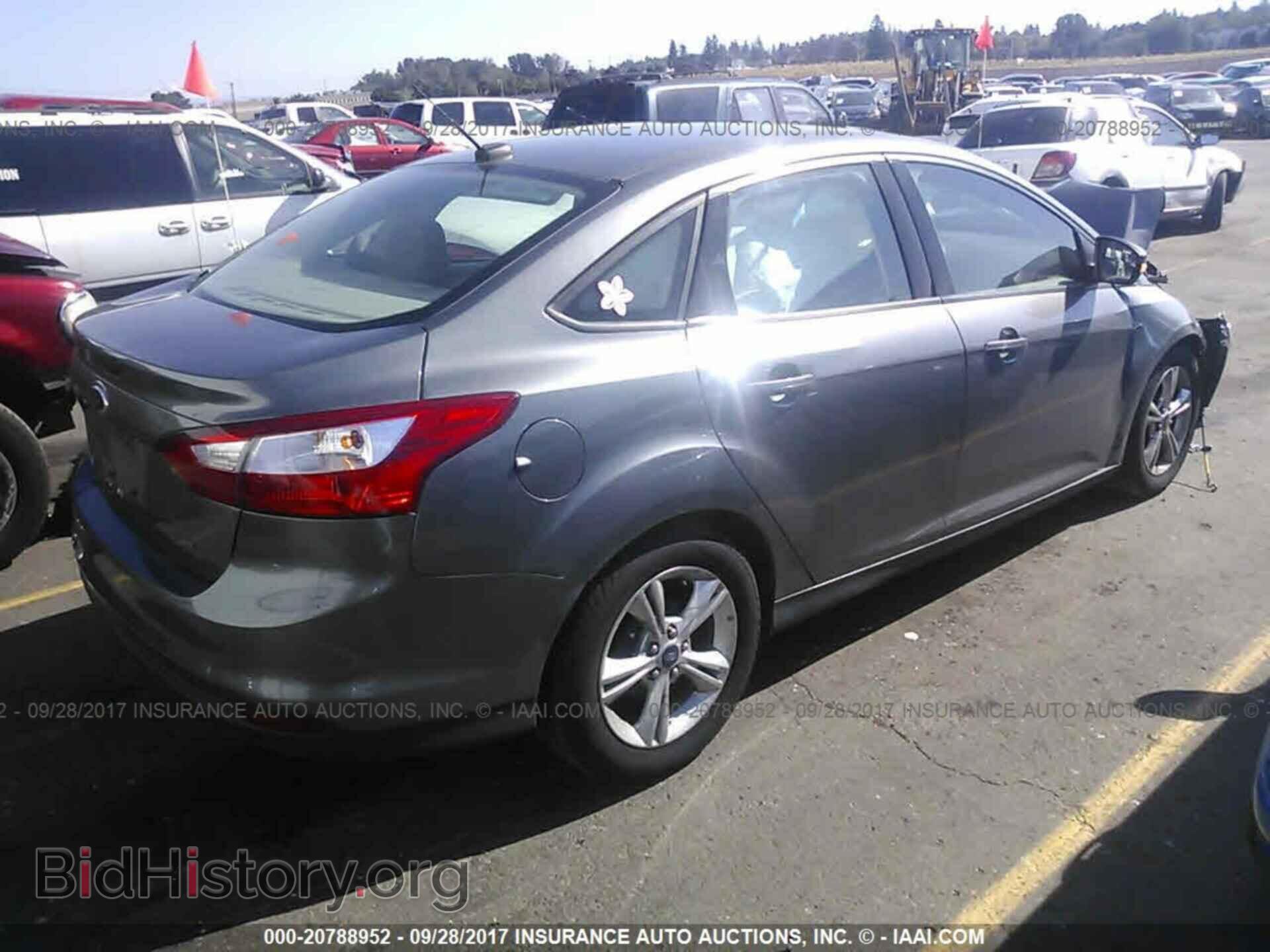 2014 Ford Focus - VIN: 1FADP3F29EL272064 - Фото 4