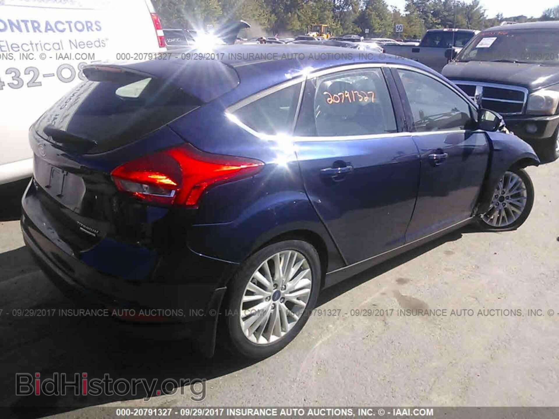 2016 Ford Focus - VIN: 1FADP3N28GL278975 - Photo 4