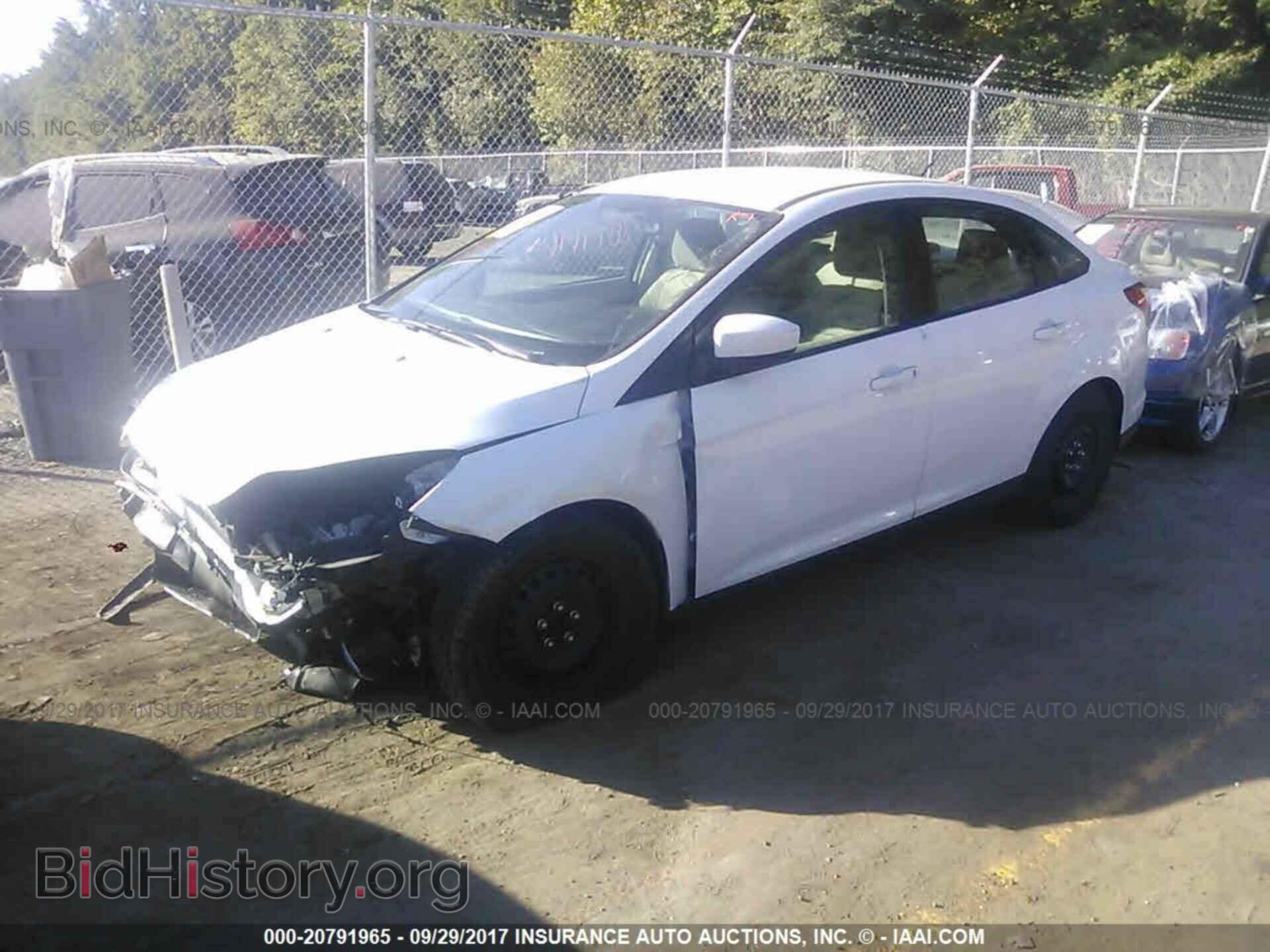 2012 Ford Focus - VIN: 1FAHP3F29CL461151 - Photo 2