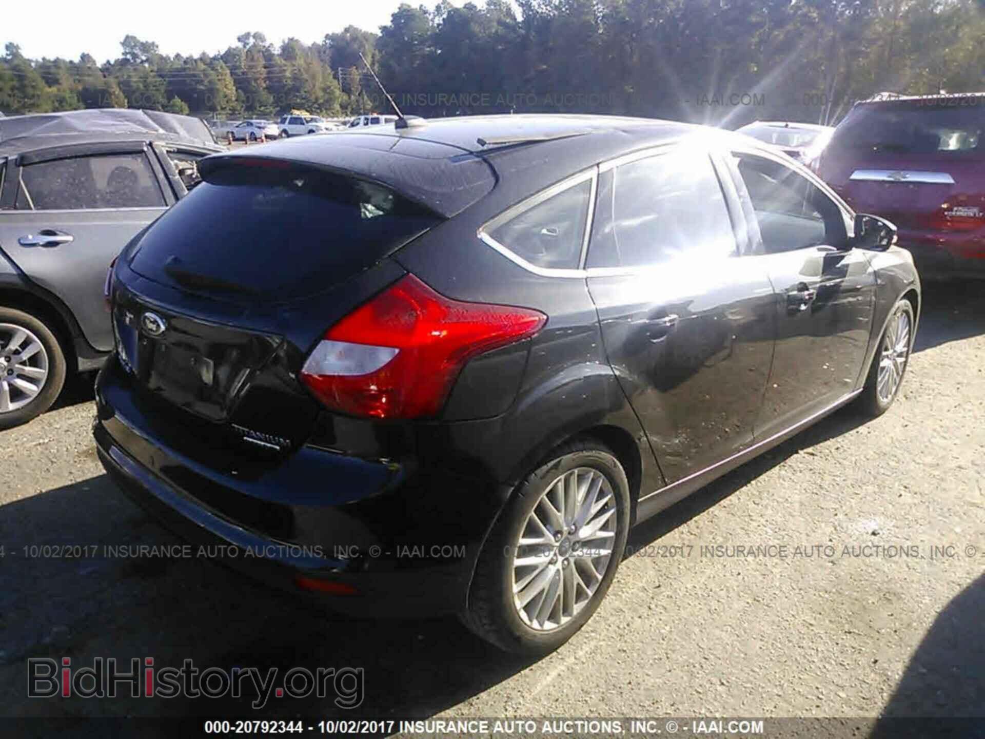 2014 Ford Focus - VIN: 1FADP3N24EL221668 - Photo 4
