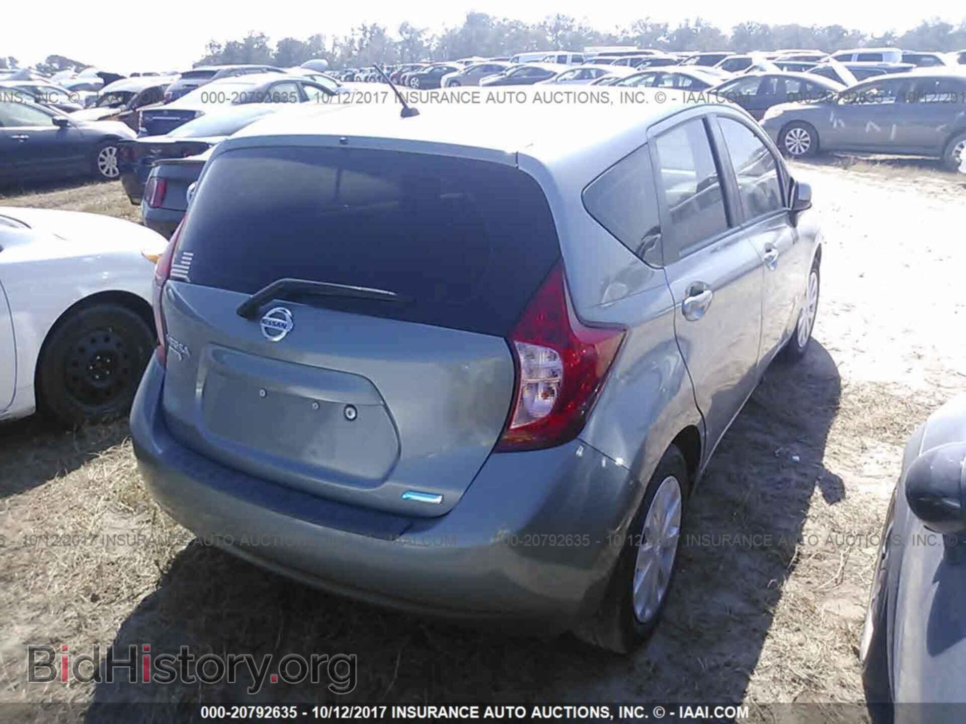 2014 Nissan Versa note - VIN: 3N1CE2CP2EL409052 - Фото 4