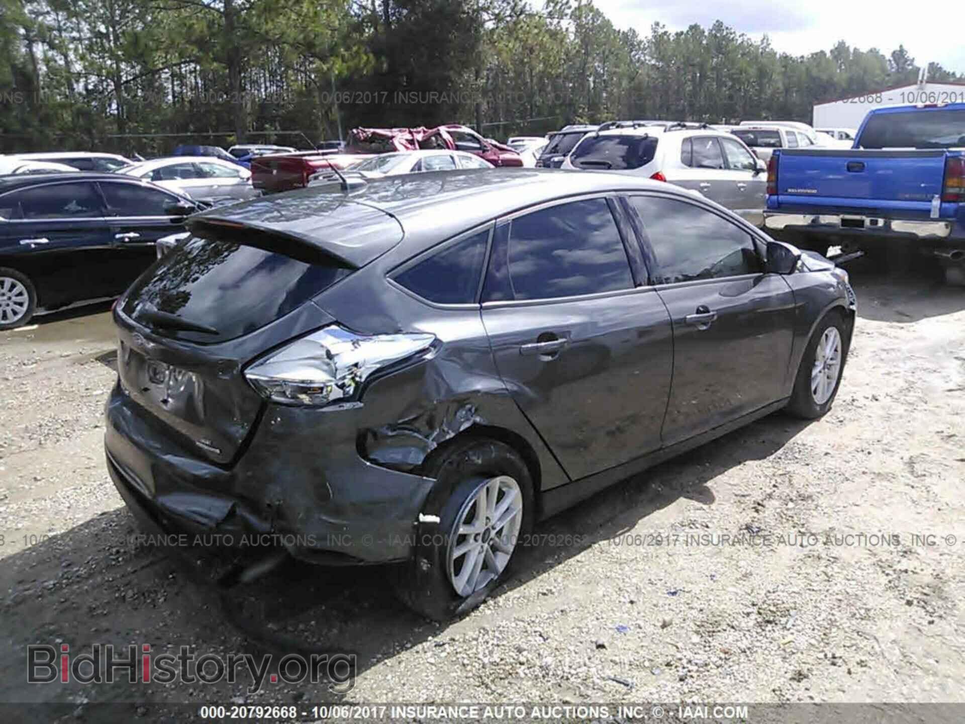 2015 Ford Focus - VIN: 1FADP3K21FL381691 - Photo 4