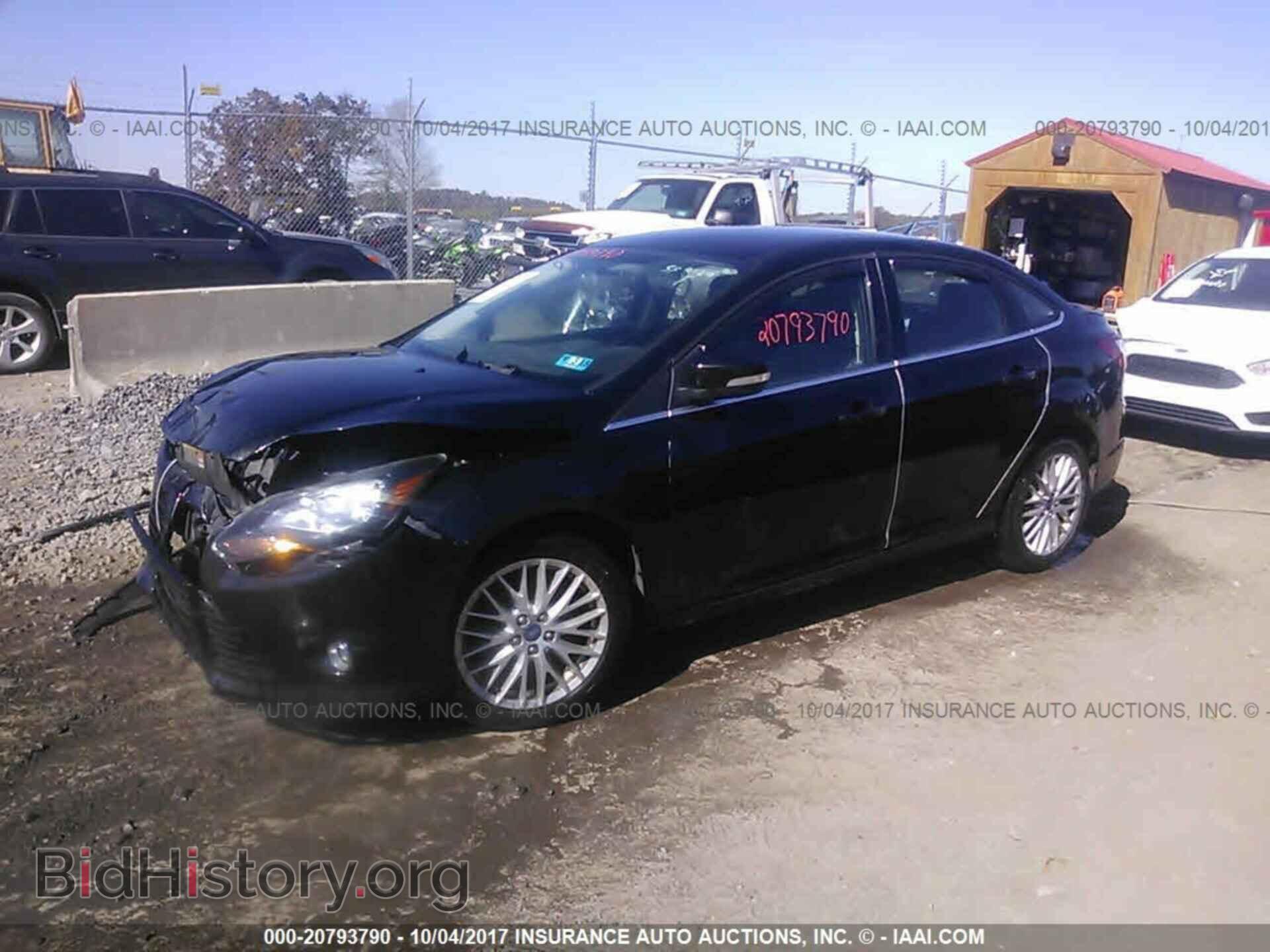 2013 Ford Focus - VIN: 1FADP3J21DL143712 - Фото 2