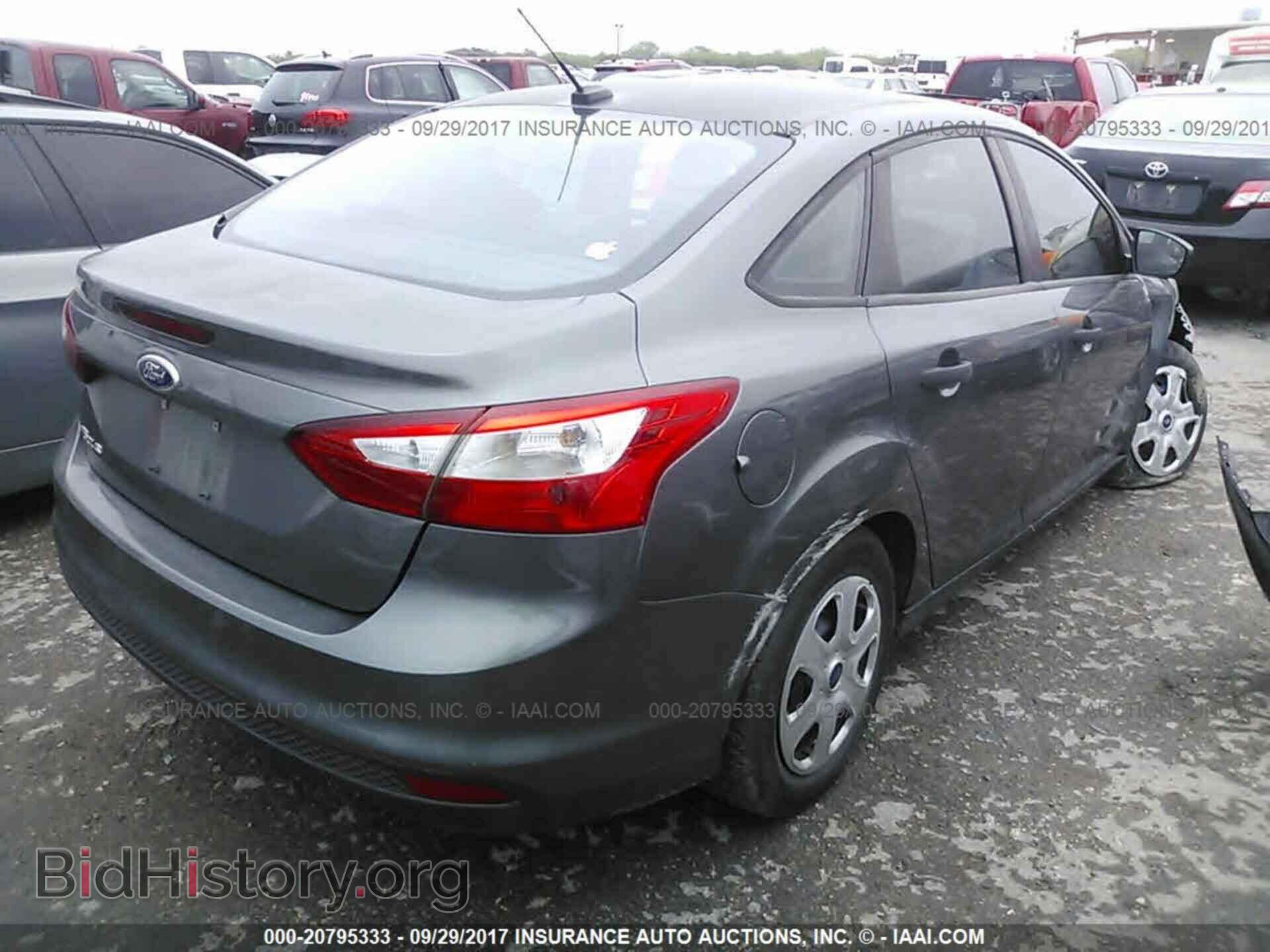 2012 Ford Focus - VIN: 1FAHP3E22CL294553 - Photo 4