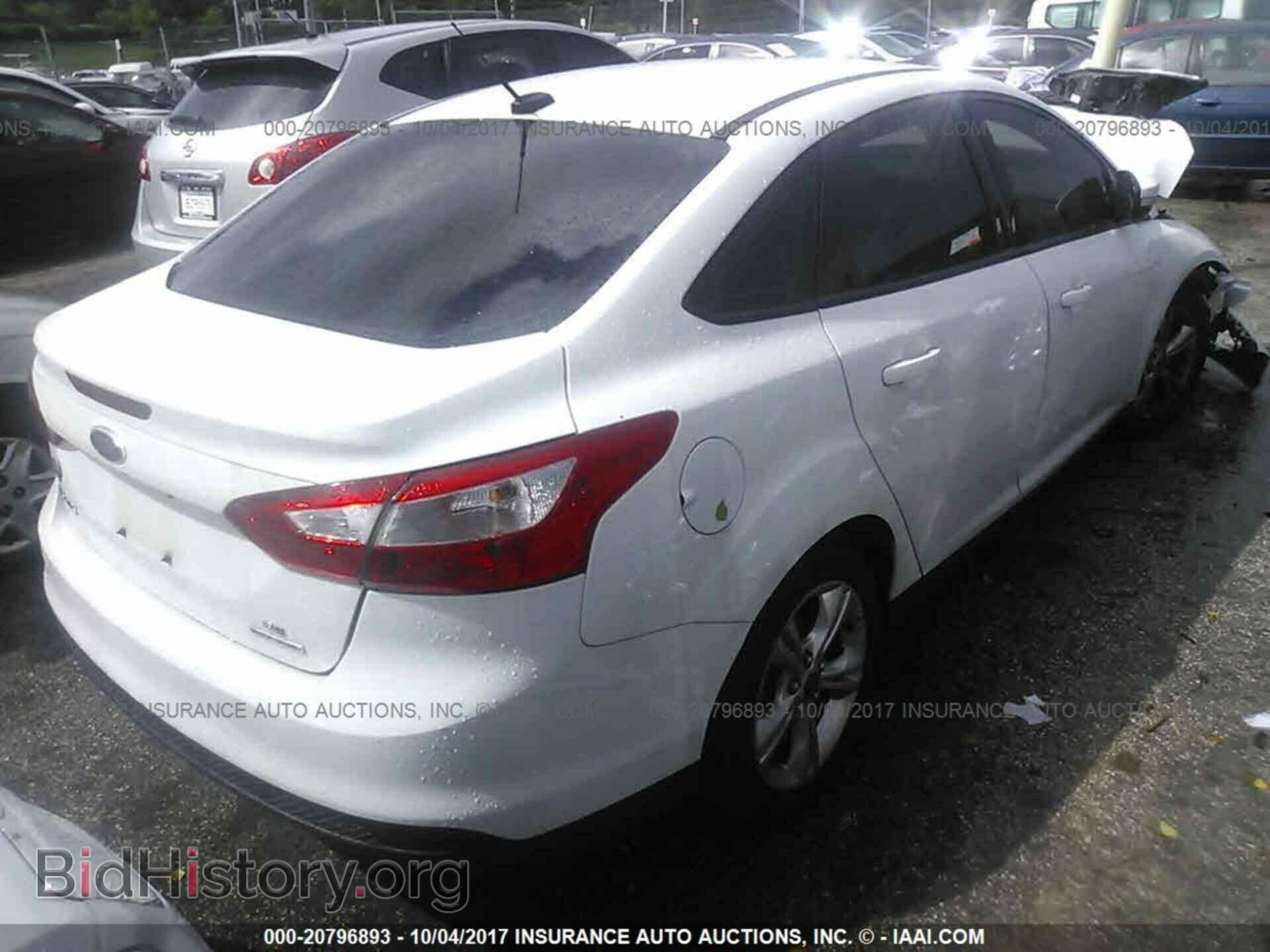 2014 Ford Focus - VIN: 1FADP3F28EL173039 - Photo 4