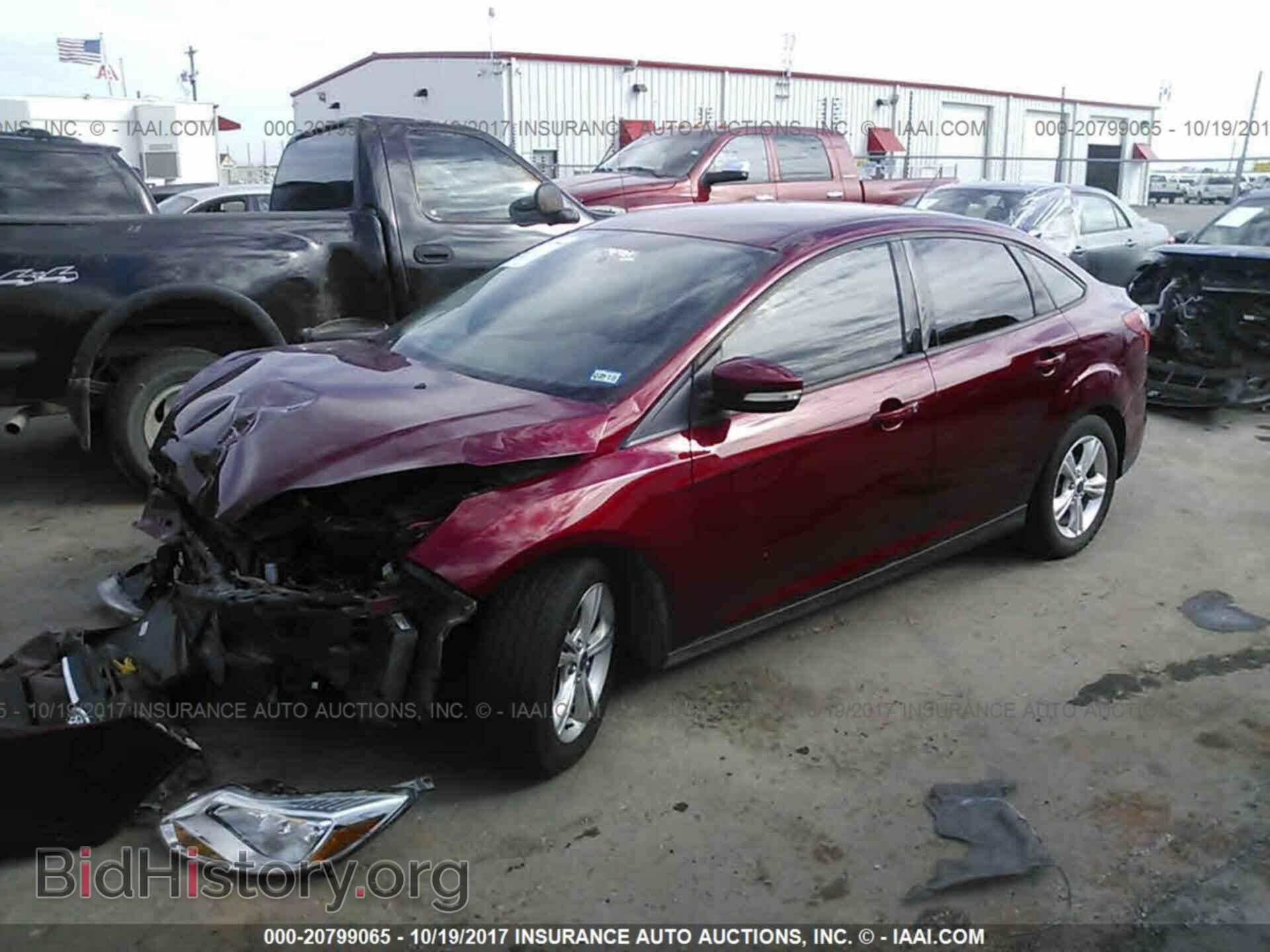 2014 Ford Focus - VIN: 1FADP3F20EL372960 - Фото 2