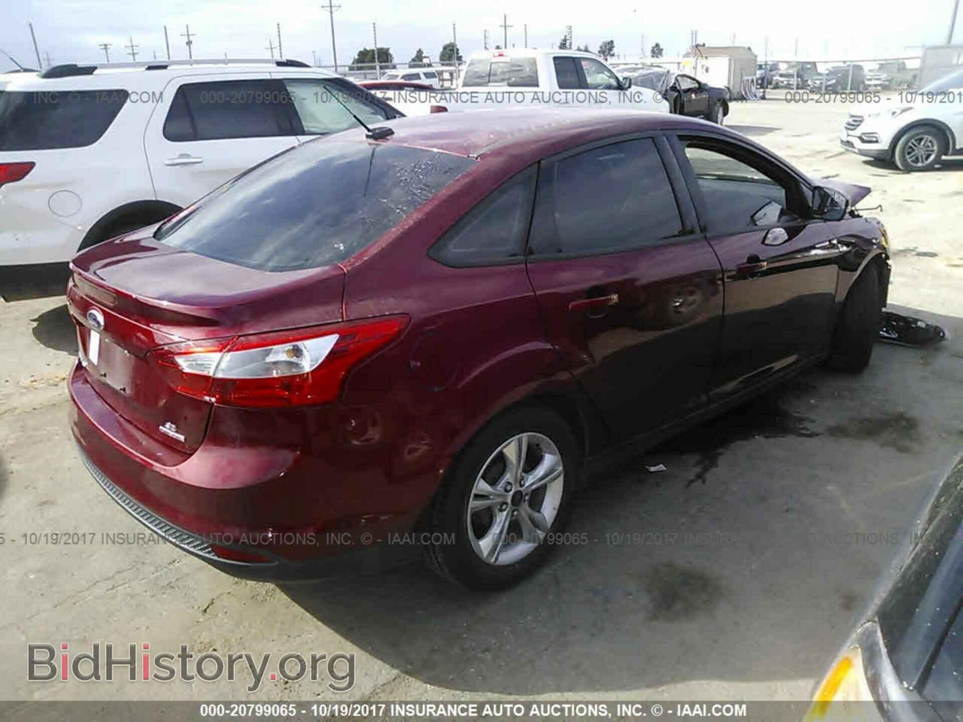2014 Ford Focus - VIN: 1FADP3F20EL372960 - Фото 4