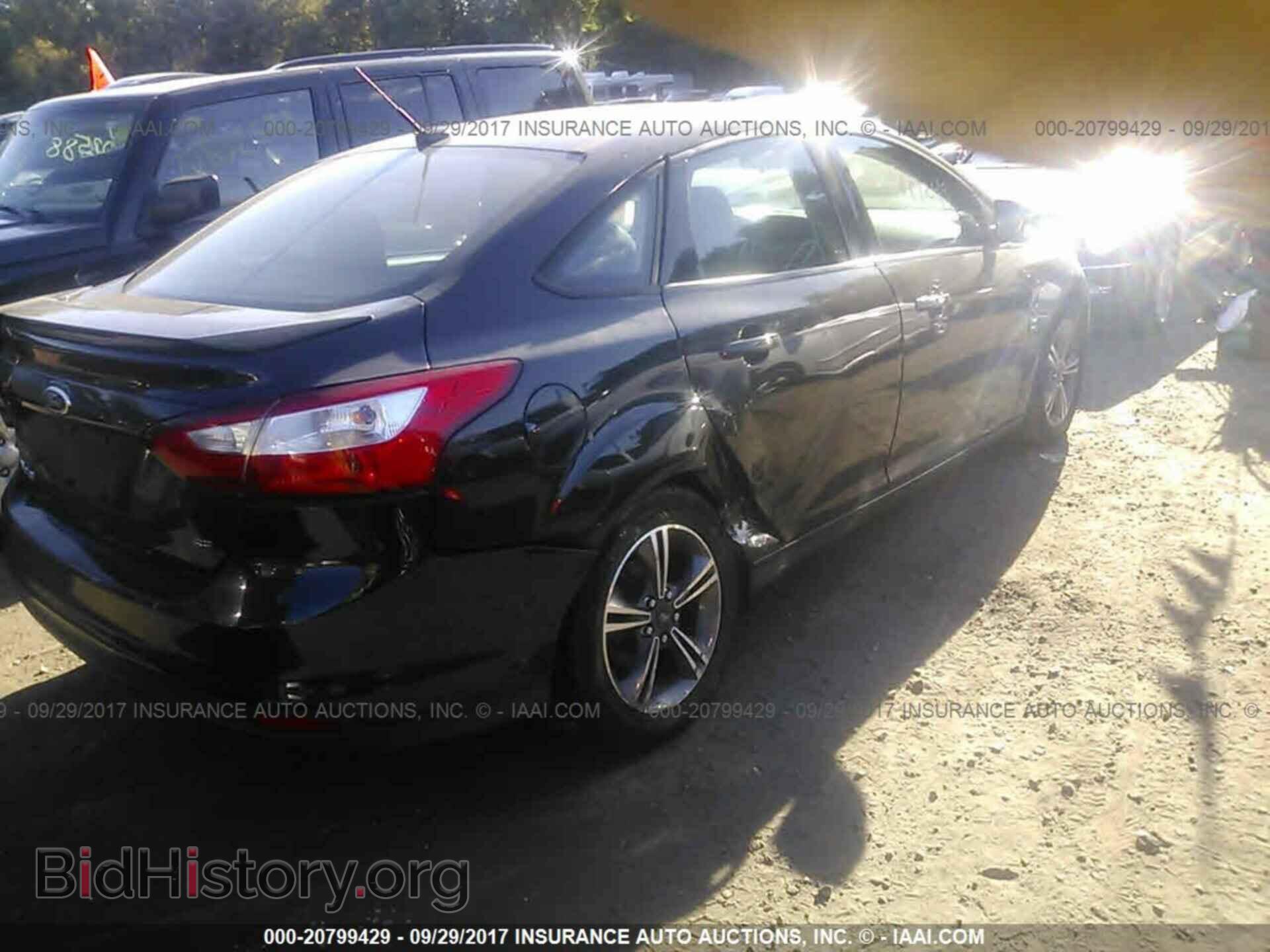 2014 Ford Focus - VIN: 1FADP3F29EL386064 - Фото 4