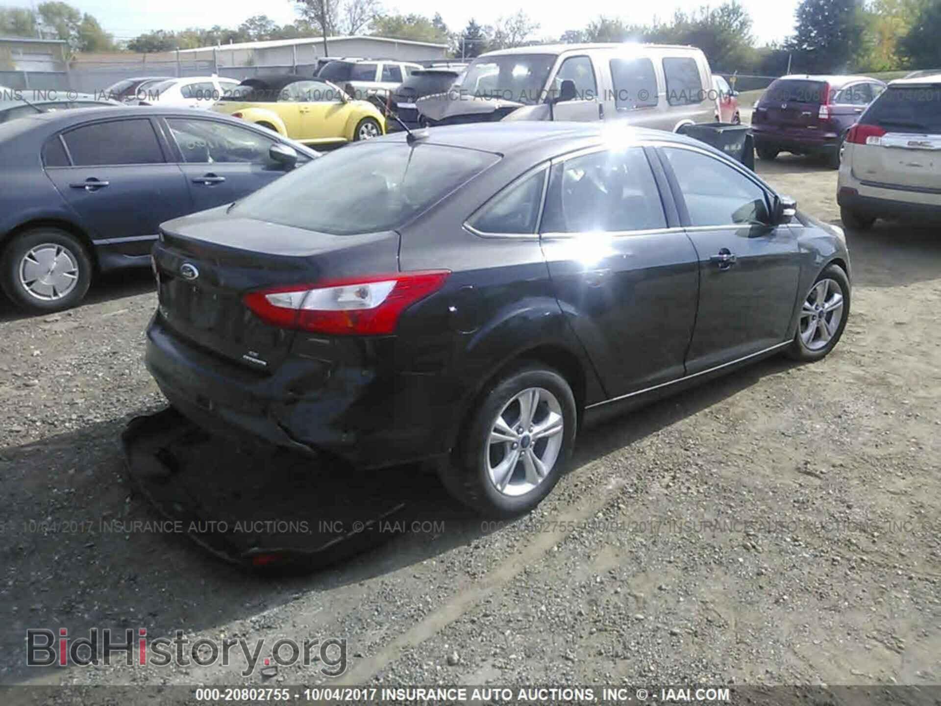 2014 Ford Focus - VIN: 1FADP3F20EL116236 - Фото 4