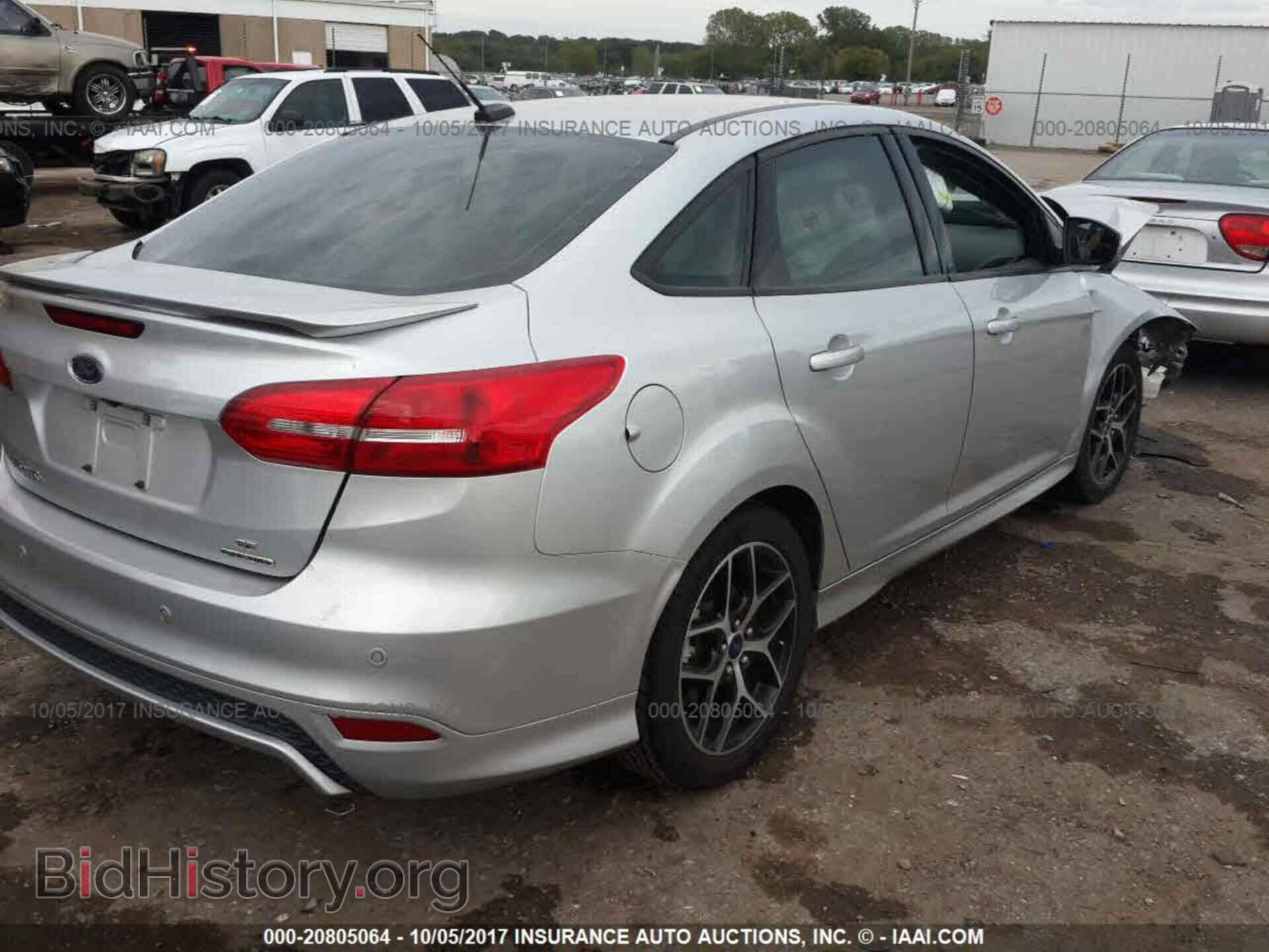 2015 Ford Focus - VIN: 1FADP3F27FL219736 - Photo 4