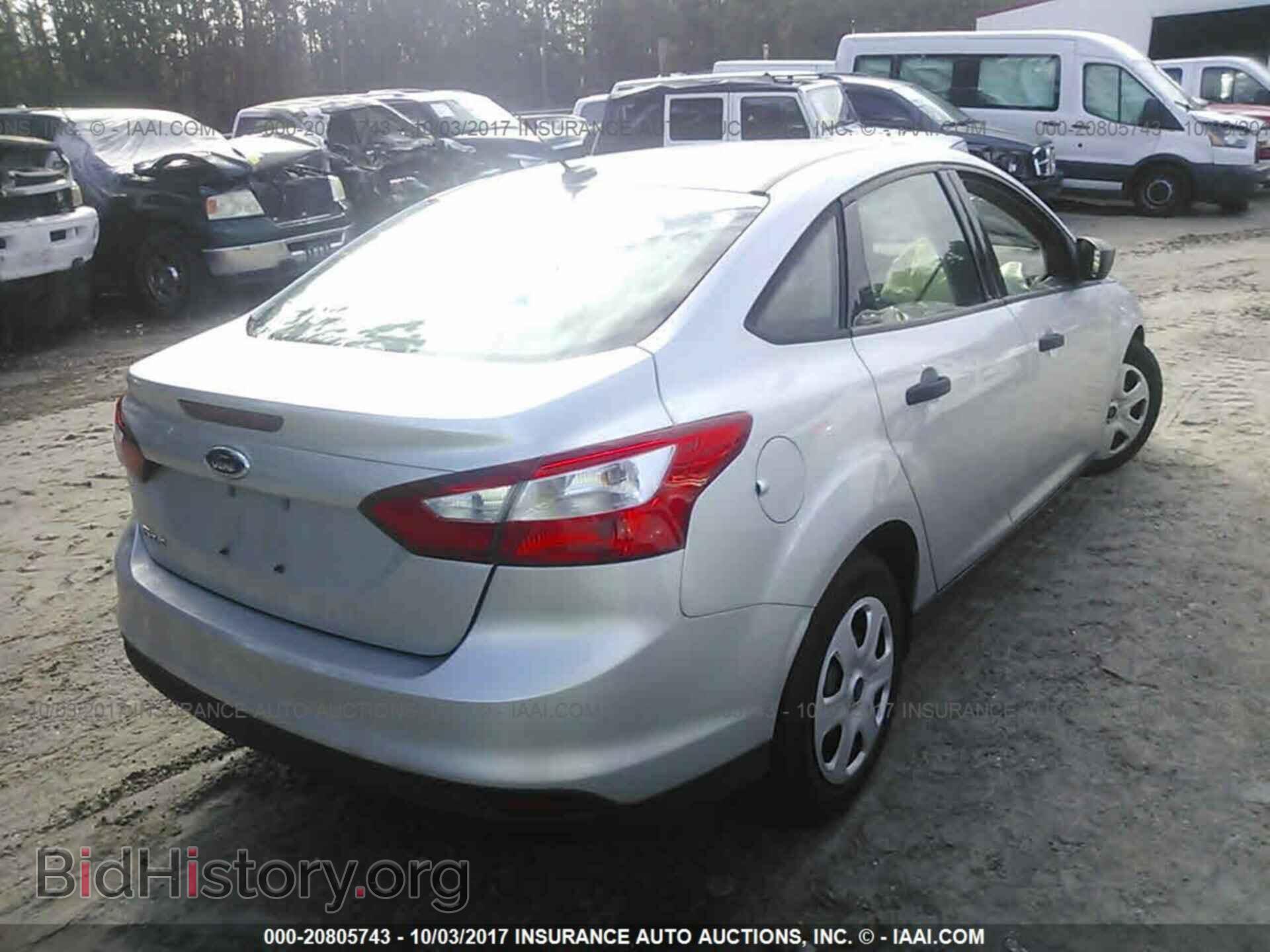 2012 Ford Focus - VIN: 1FAHP3E29CL352884 - Photo 4